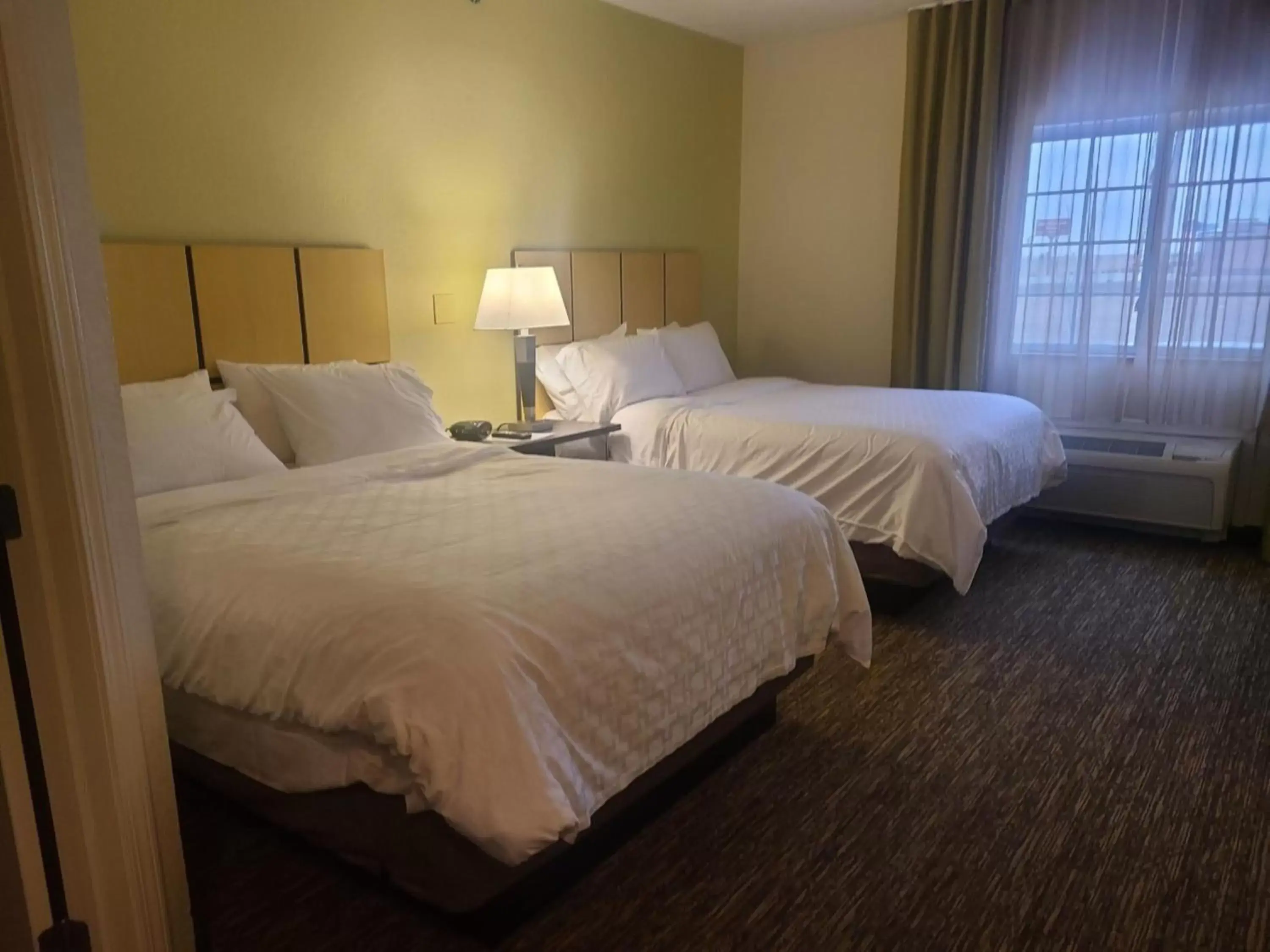 Photo of the whole room, Bed in Candlewood Suites Bismarck