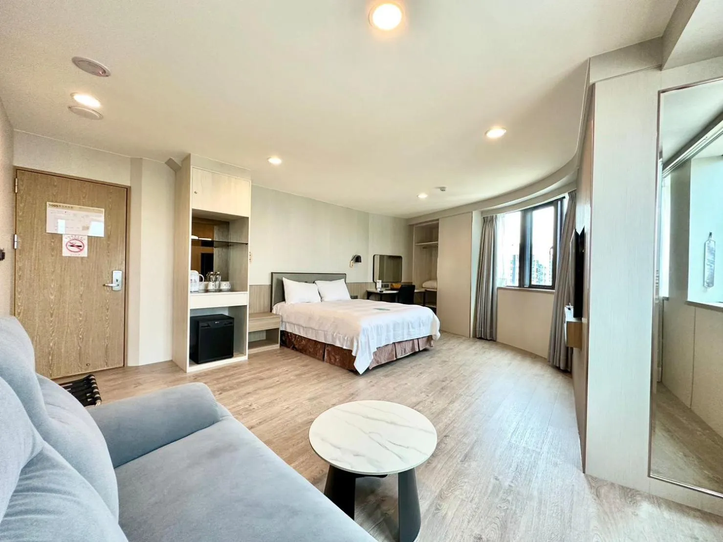 Bed in Grand Earl Hotel