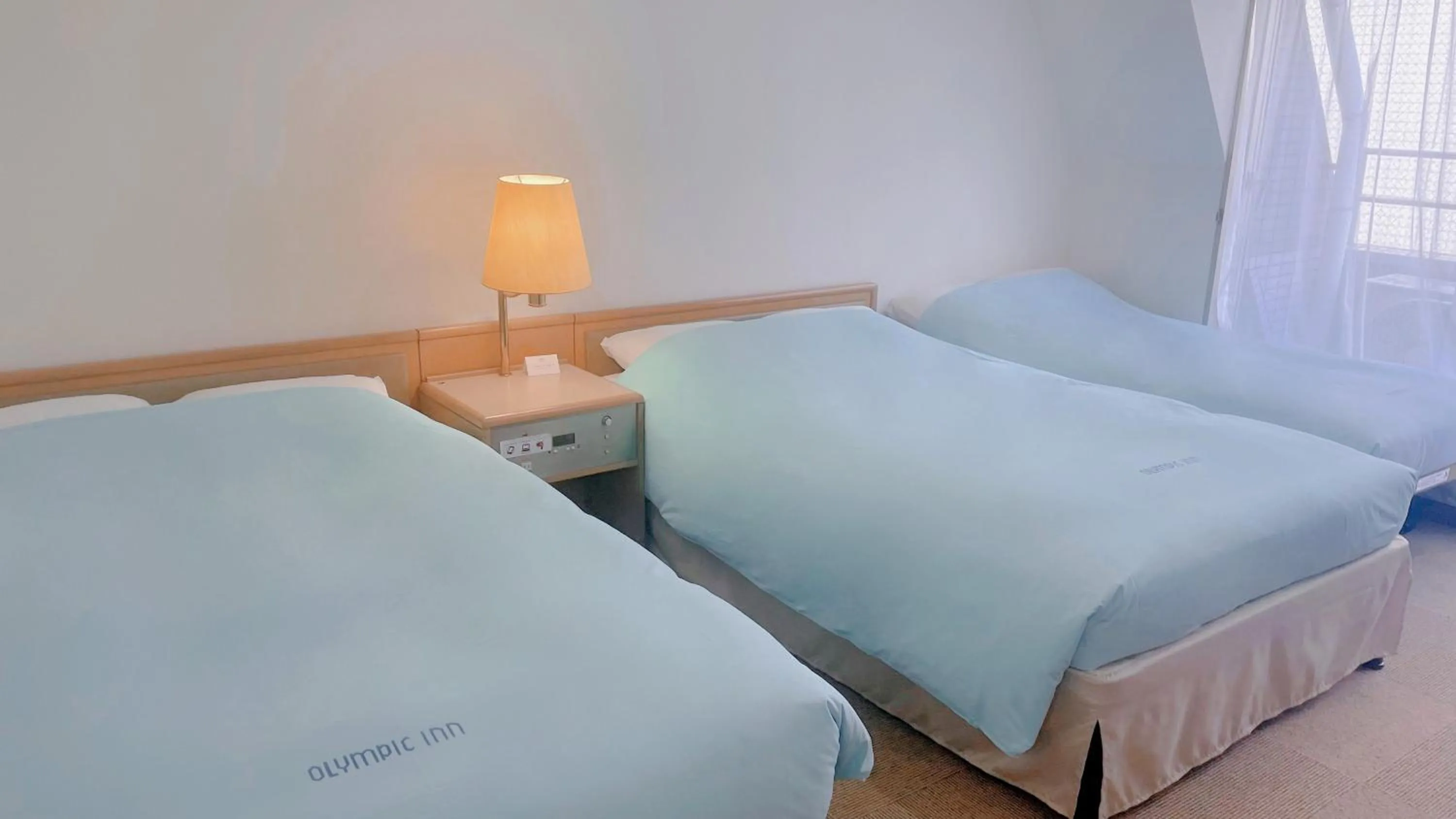 Bed in Olympic Inn Kanda