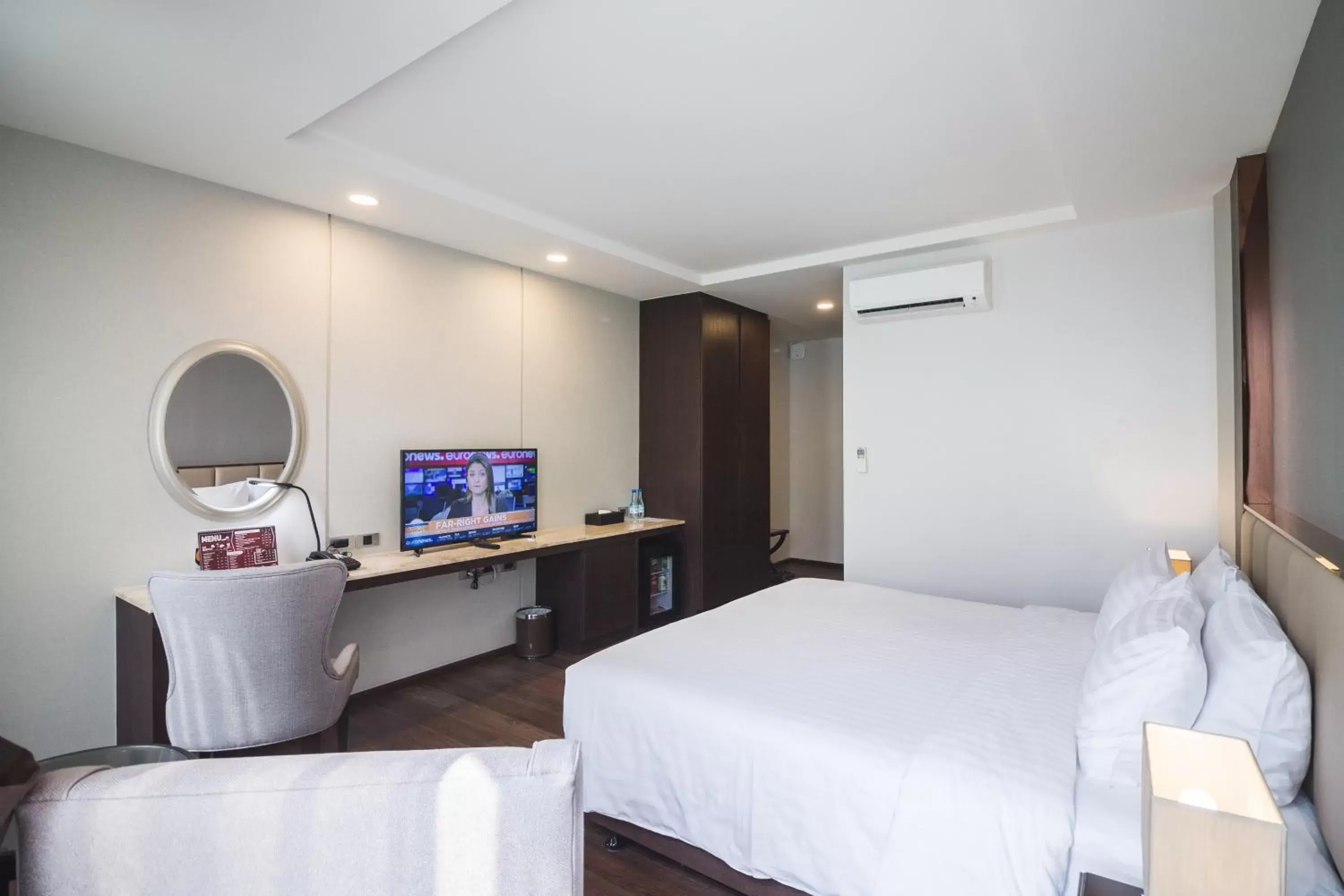 TV and multimedia in SureStay Plus Hotel by Best Western Sukhumvit 2