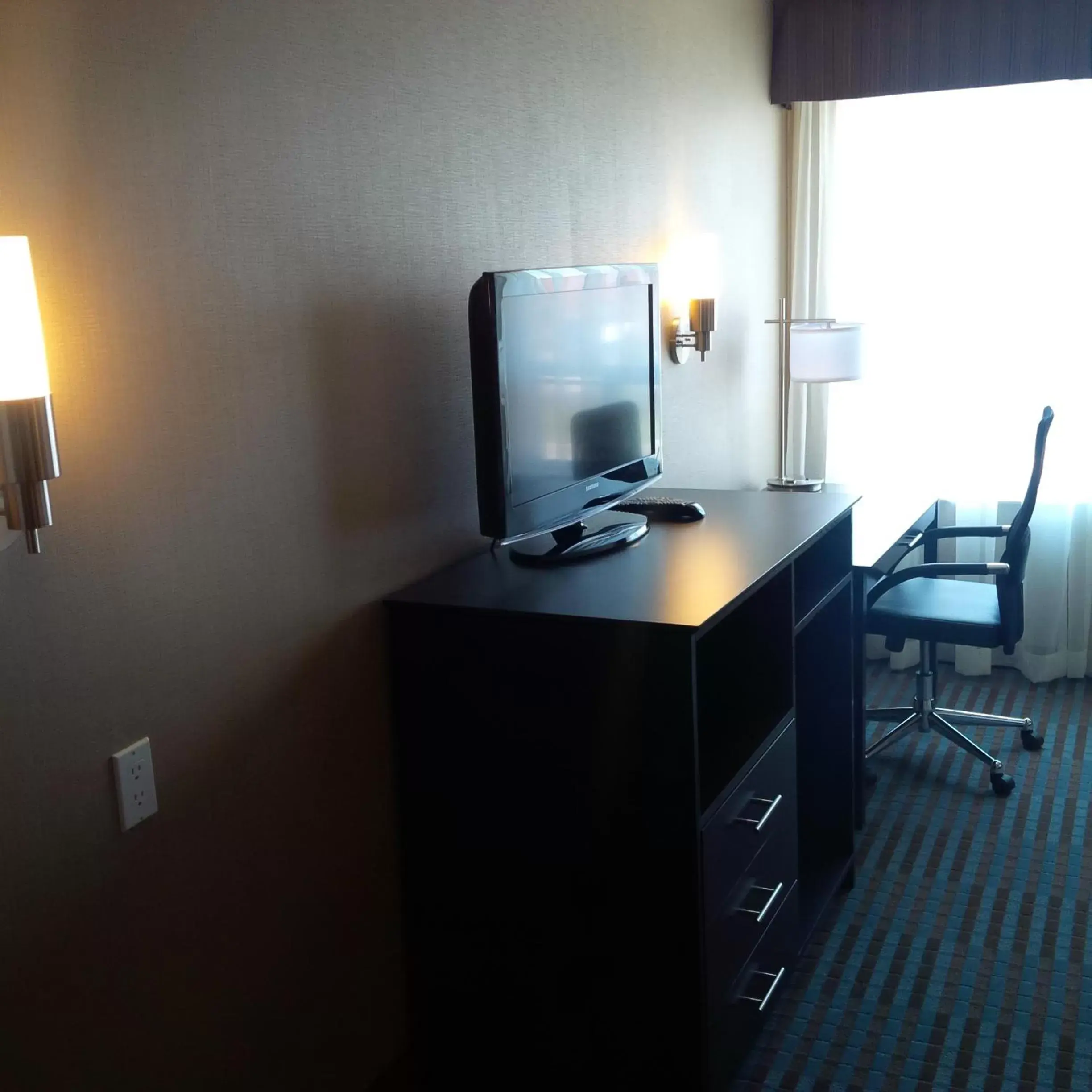 Seating area, TV/Entertainment Center in Days Inn by Wyndham Stouffville