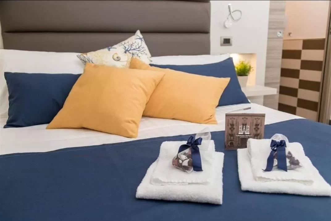 Bed in Palazzo Sisto Exclusive Rooms