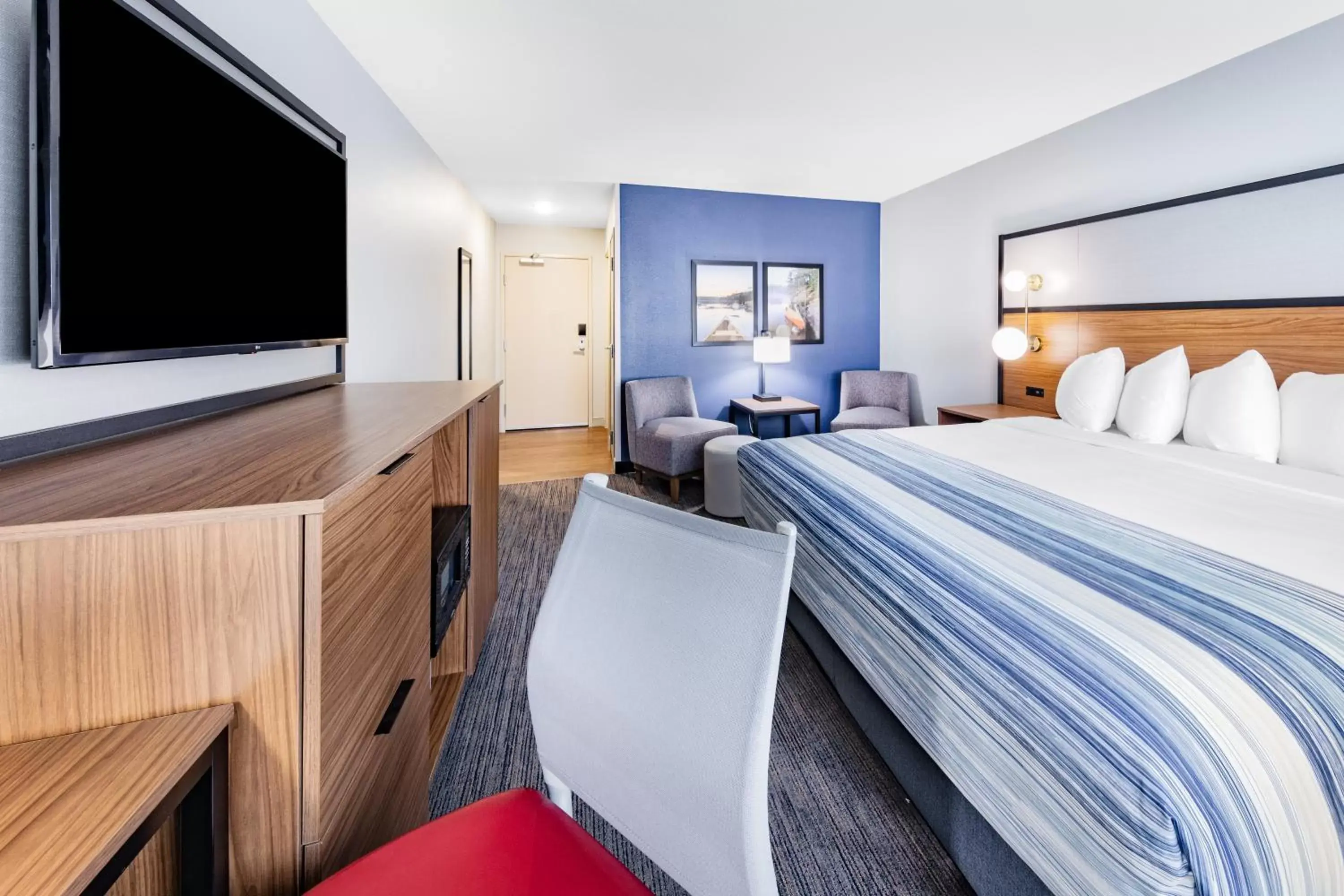 Bed in AmericInn by Wyndham International Falls