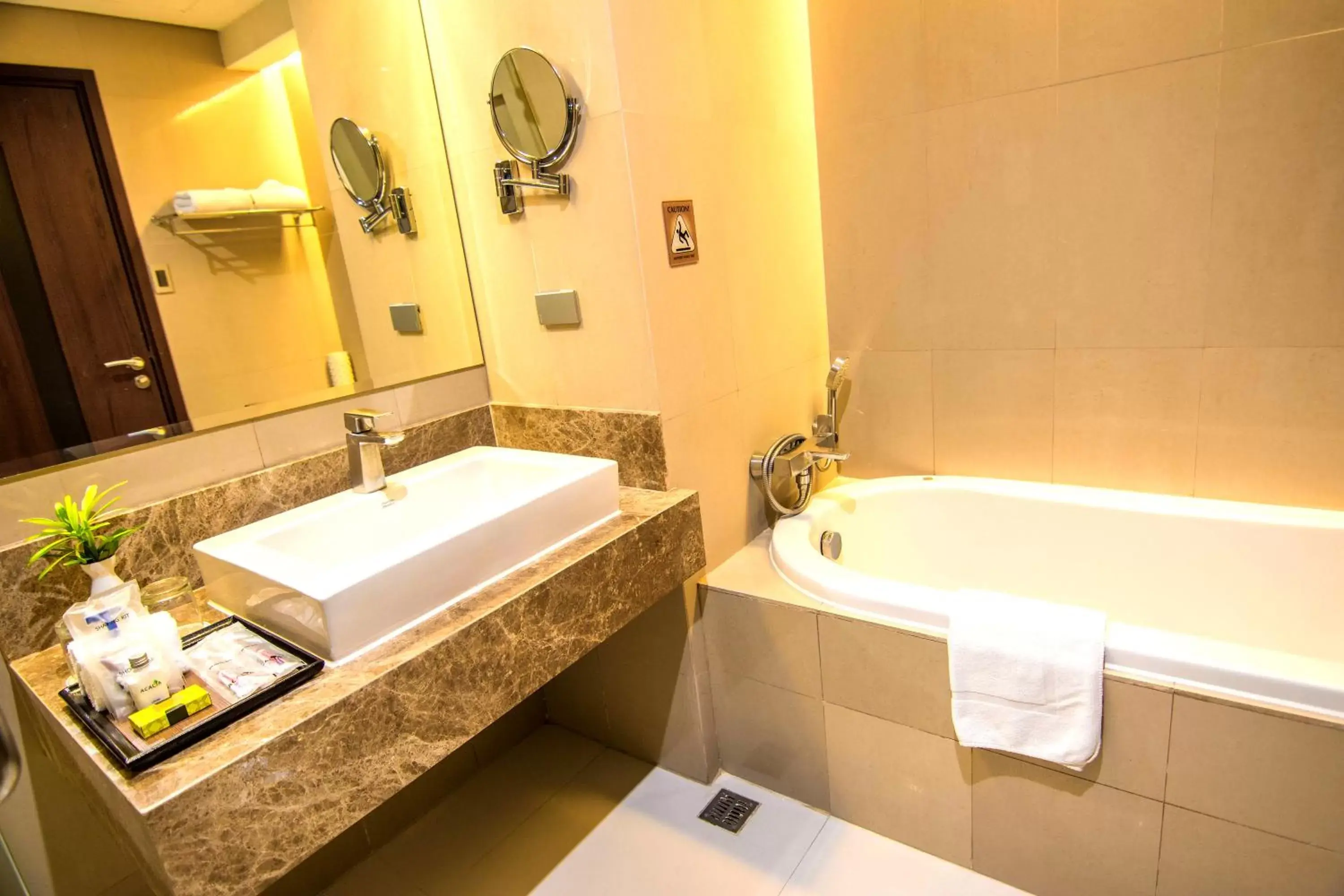 Bathroom in Acacia Hotel Manila - Multiple Use Hotel