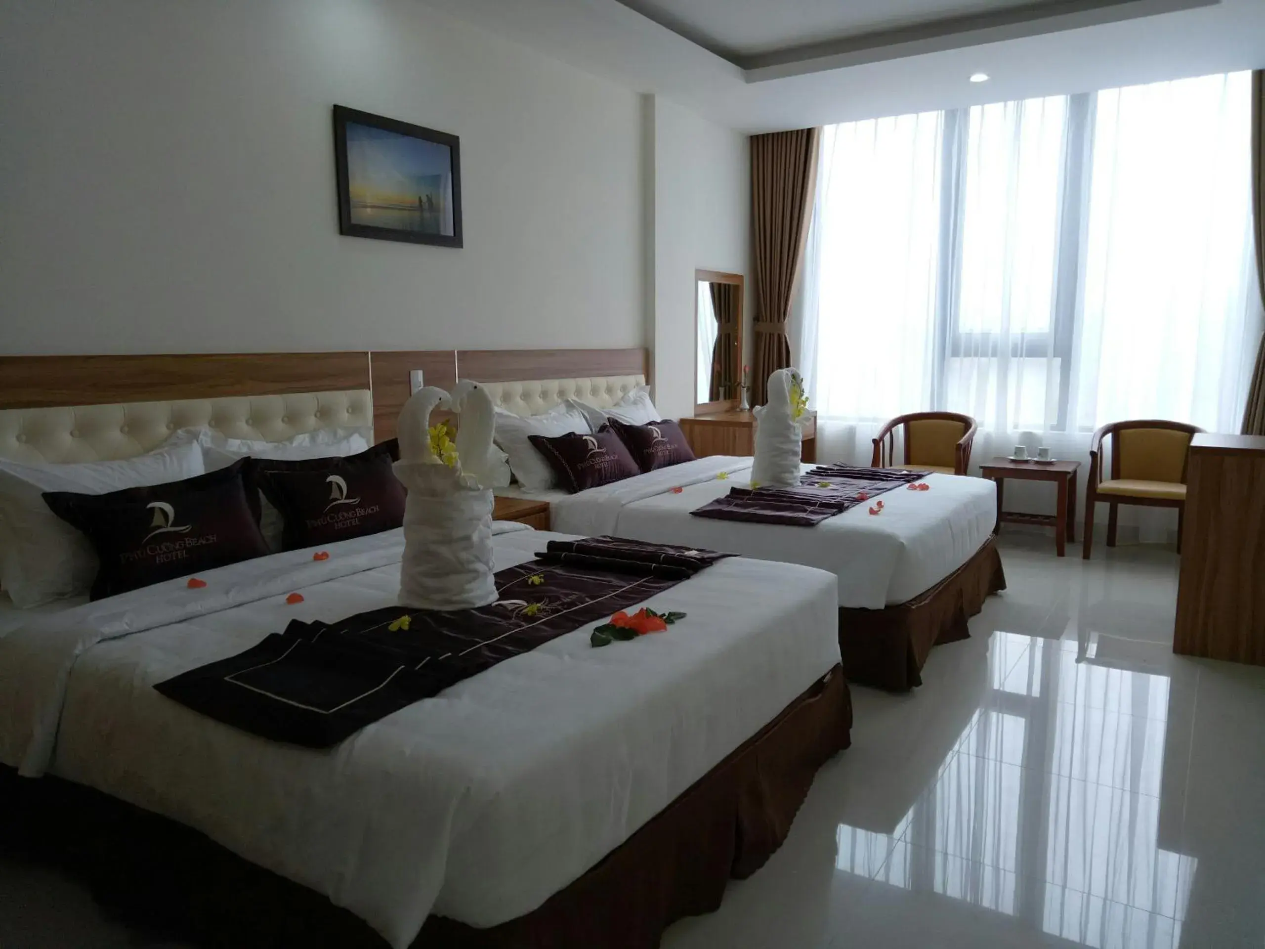 Bed in Phu Cuong Beach Hotel