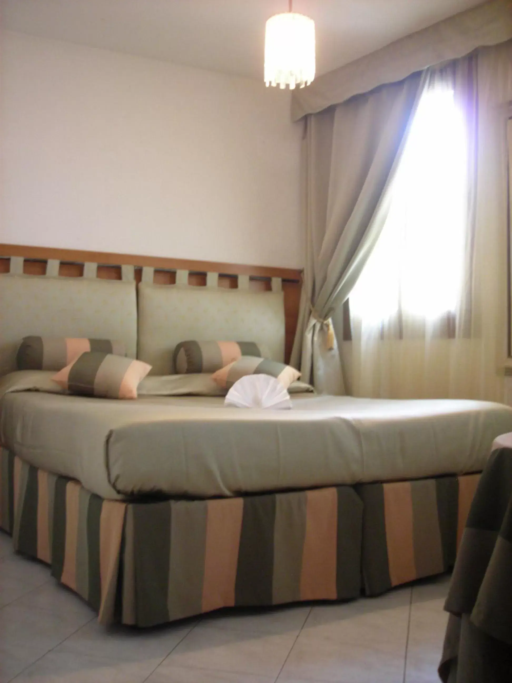 Bed in Albergo Marin
