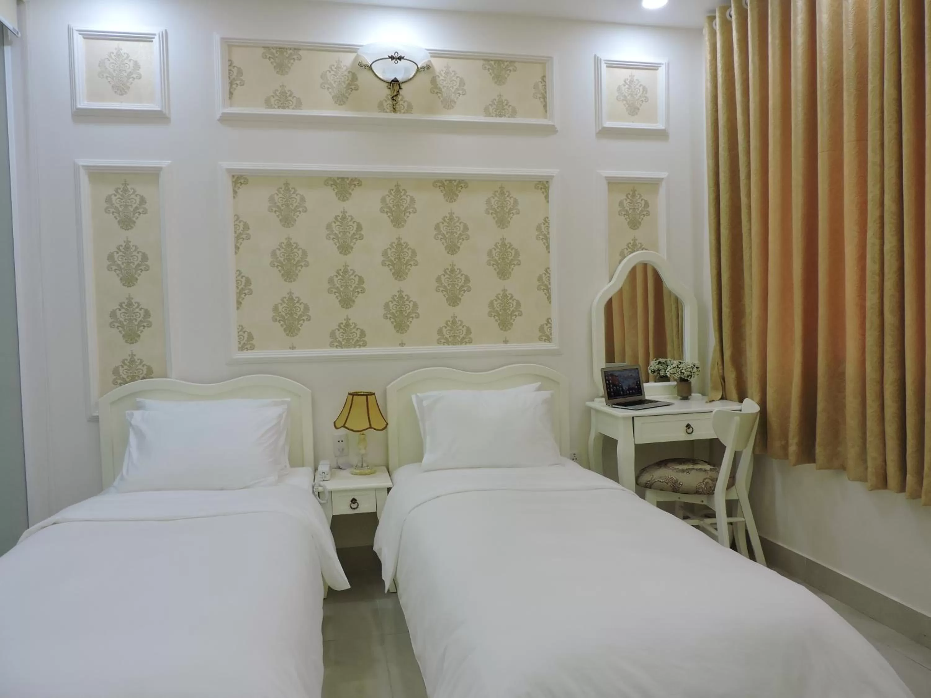 Bed in Chez Lotus Rose