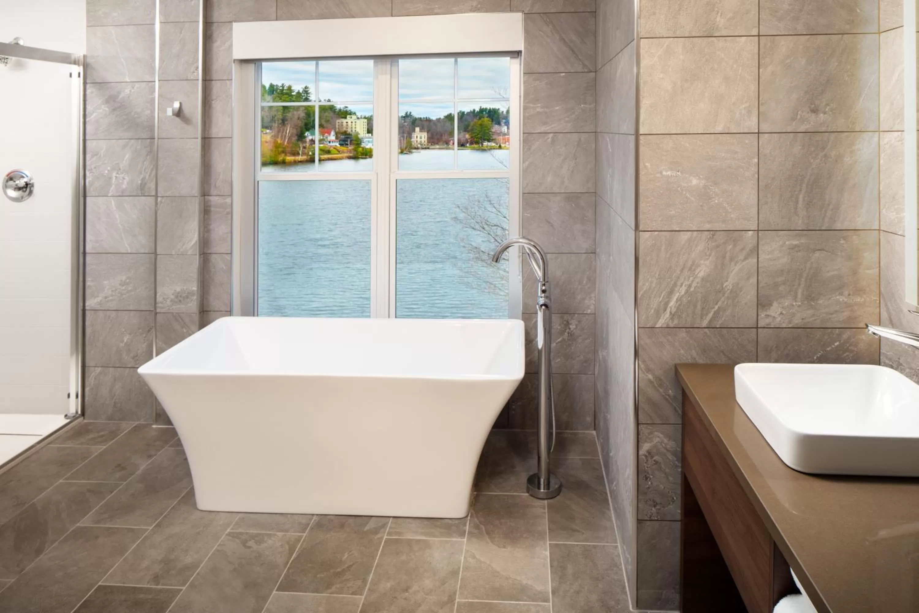 Bathroom in voco Saranac Lake NY - Waterfront by IHG
