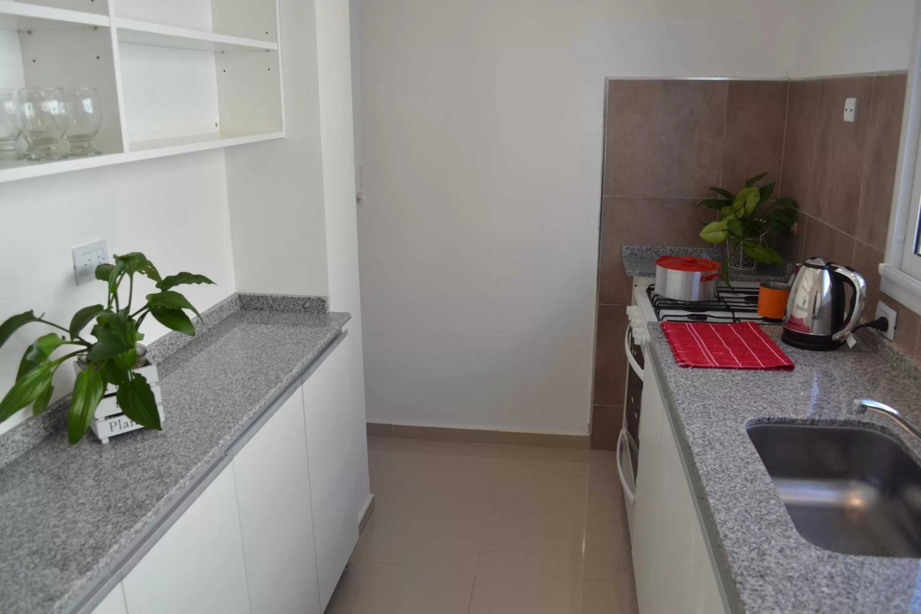 Kitchen/Kitchenette in Apart Porto del Sol by CPH