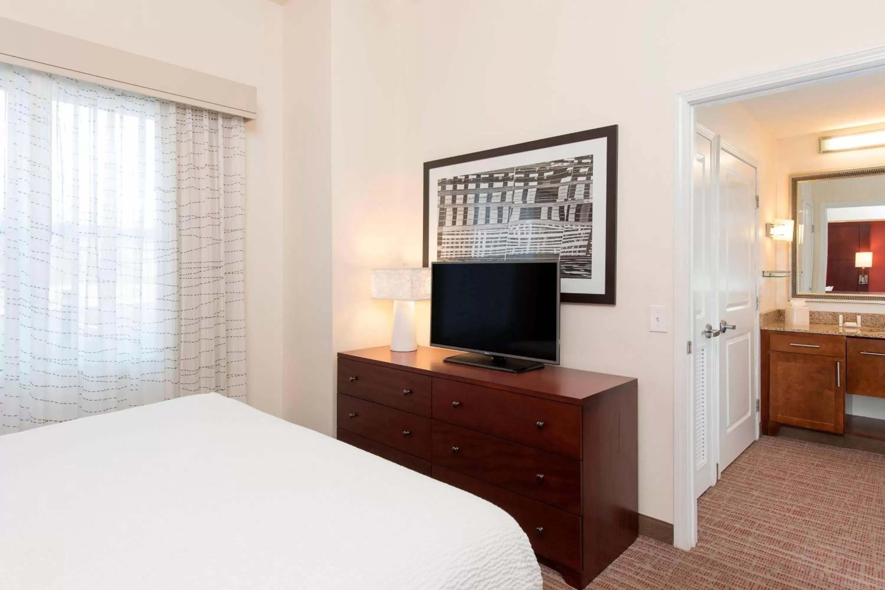 Bedroom, TV/Entertainment Center in Residence Inn Moline Quad Cities