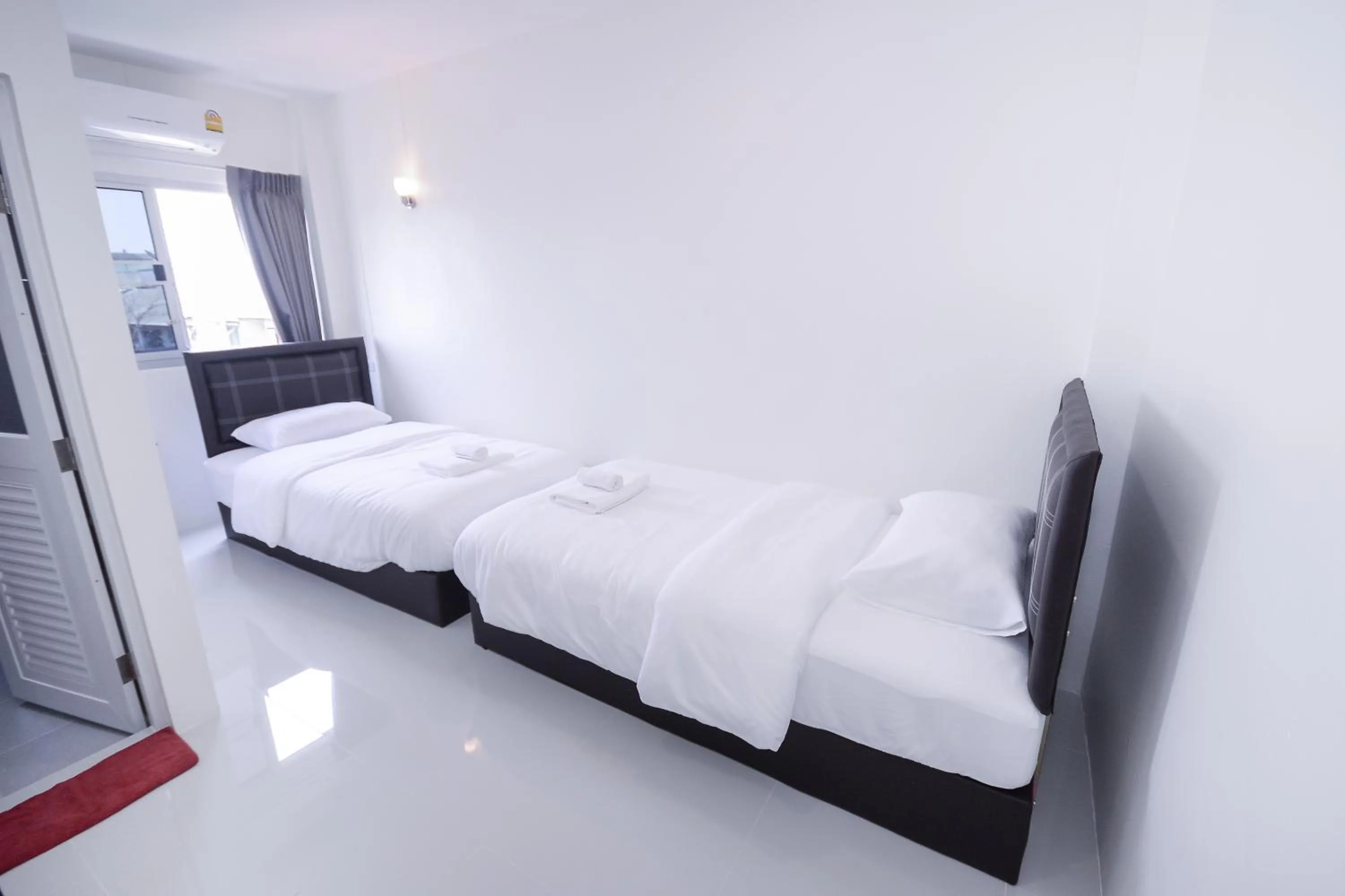 Bed in U-need Guesthouse95