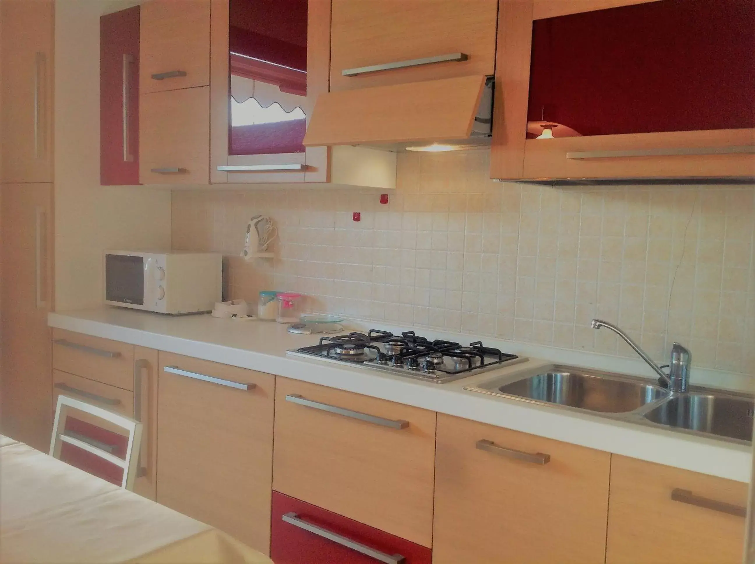 Kitchen/Kitchenette in Villaggio dei Fiori Apart- Hotel 3 Stars - Family Resort