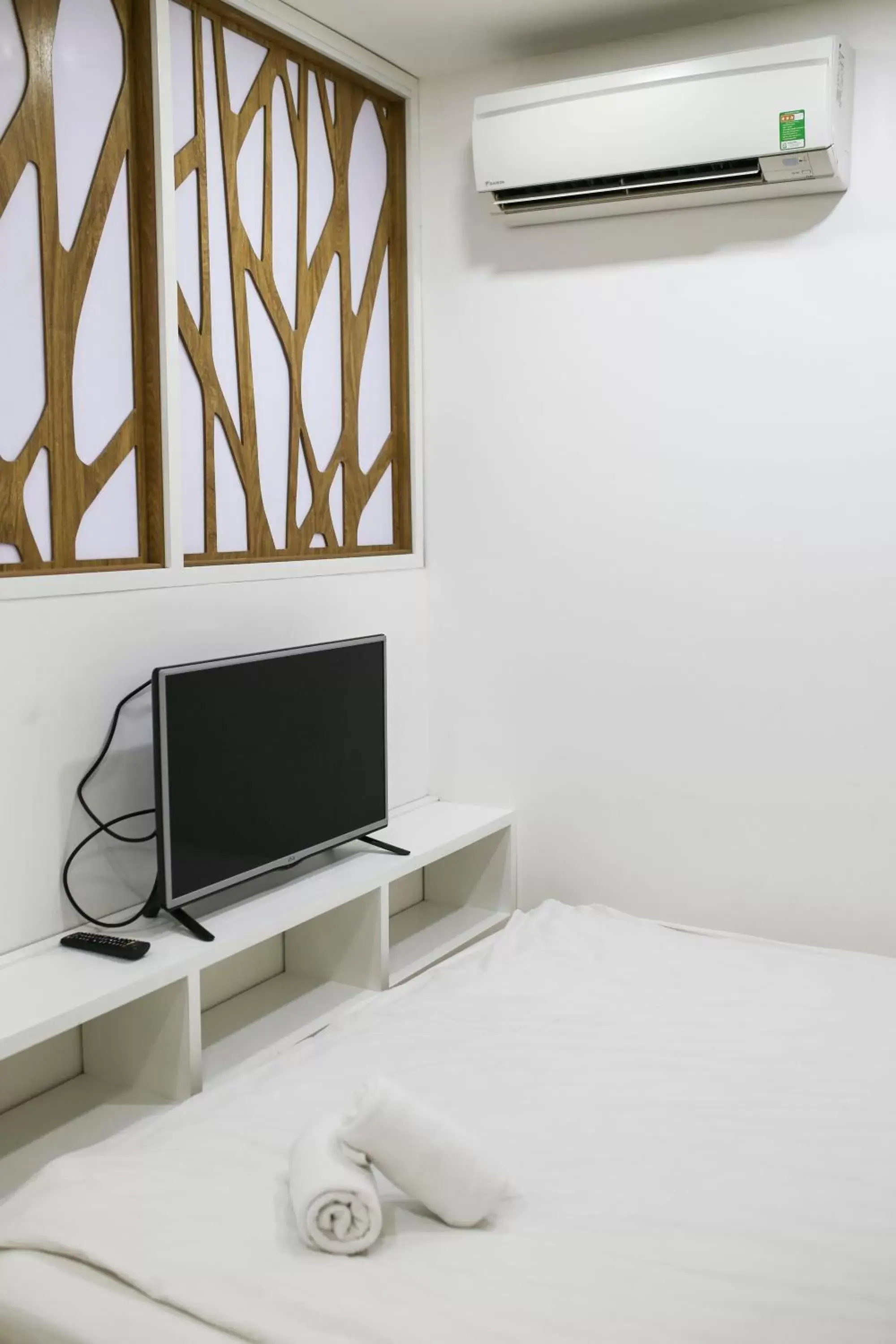 Bed, TV/Entertainment Center in Gold Ocean Apartment