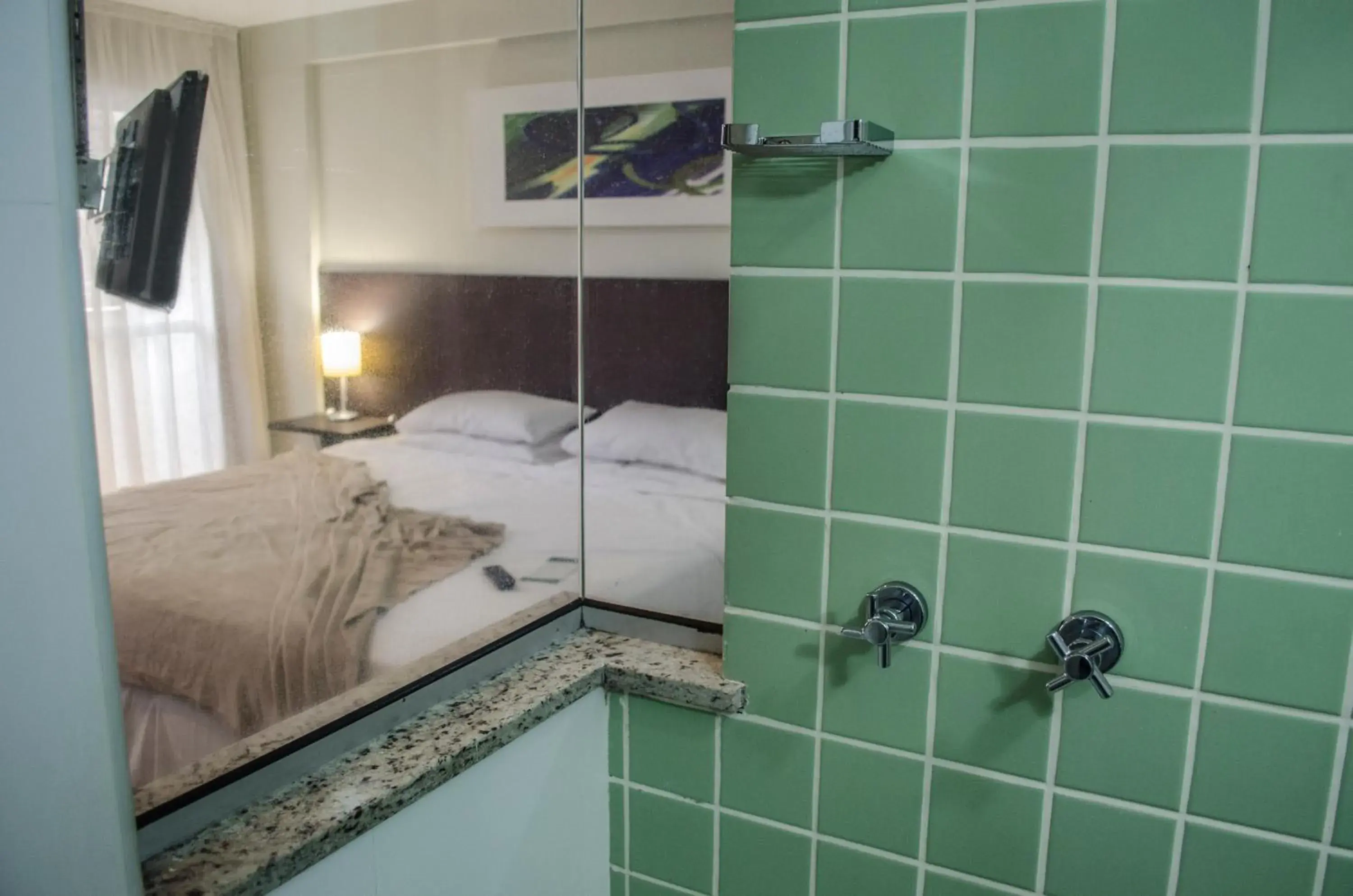 Bathroom, Bed in Mont Blanc Apart Hotel - Duque de Caxias Bathroom, Bed in Mont Blanc Apart Hotel - Duque de Caxias