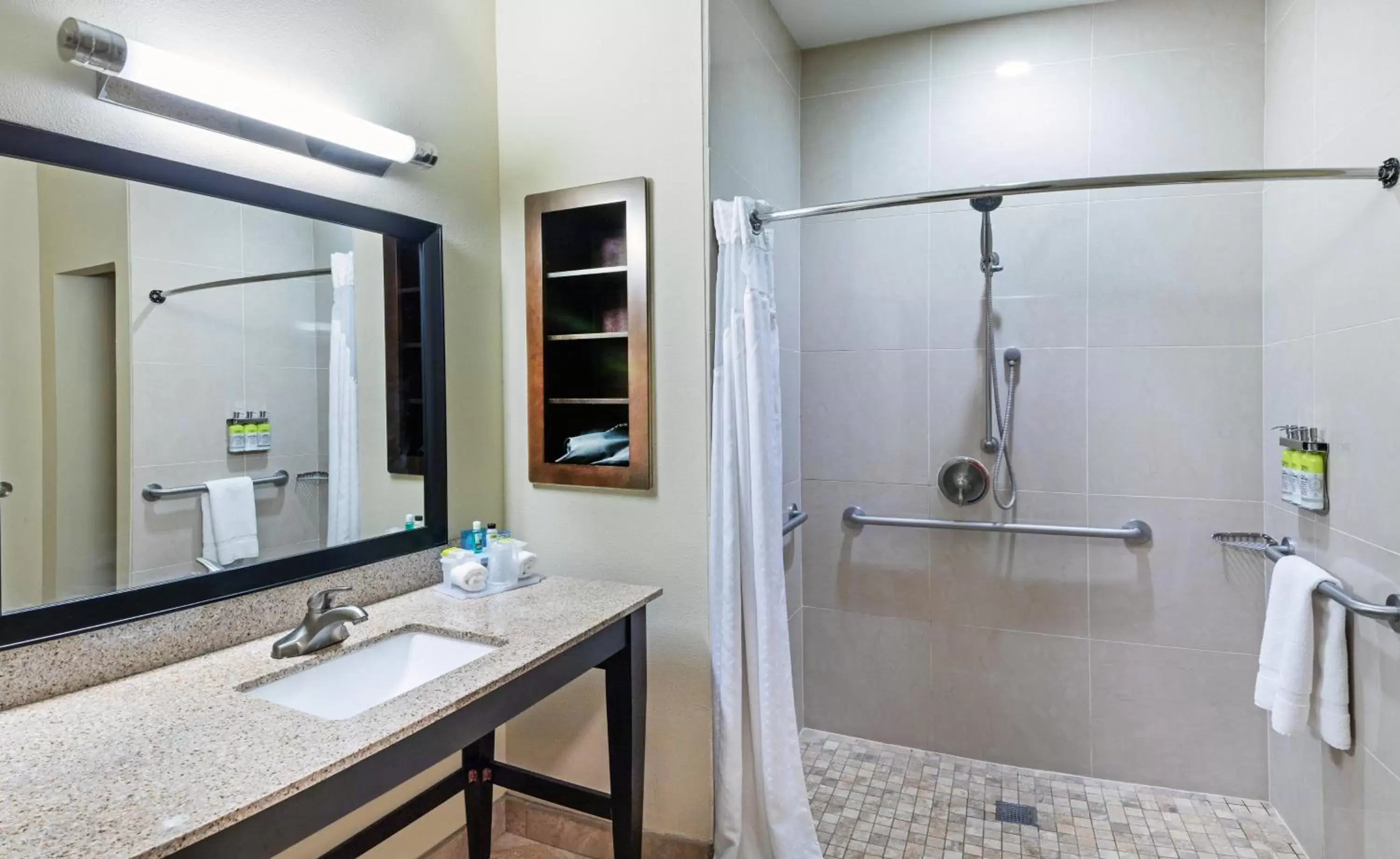 Bathroom in Holiday Inn Express Hotel & Suites Floresville, an IHG Hotel
