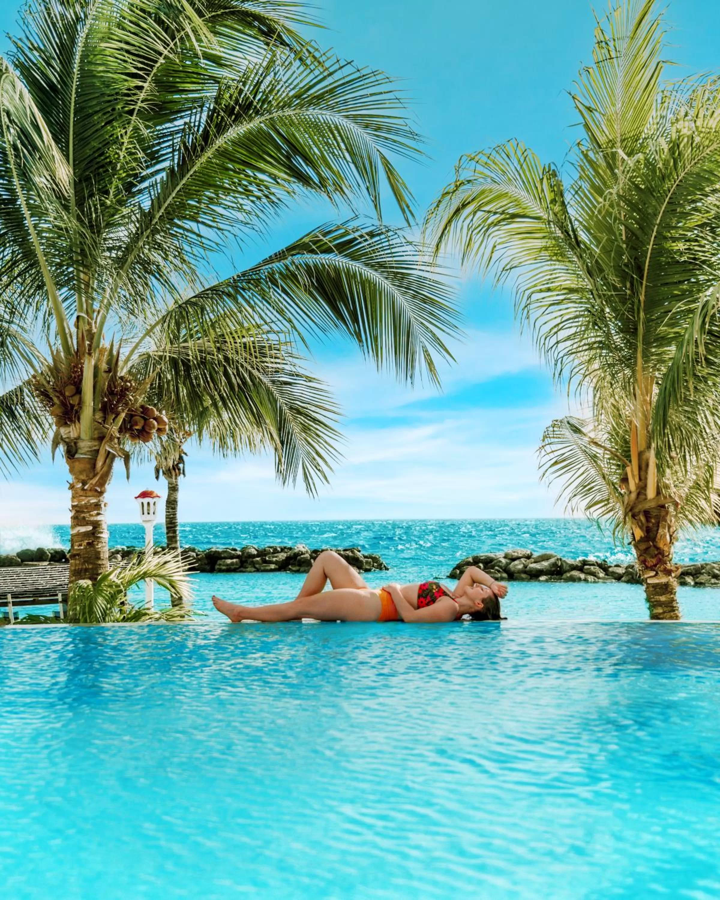 People in Curacao Avila Beach Hotel