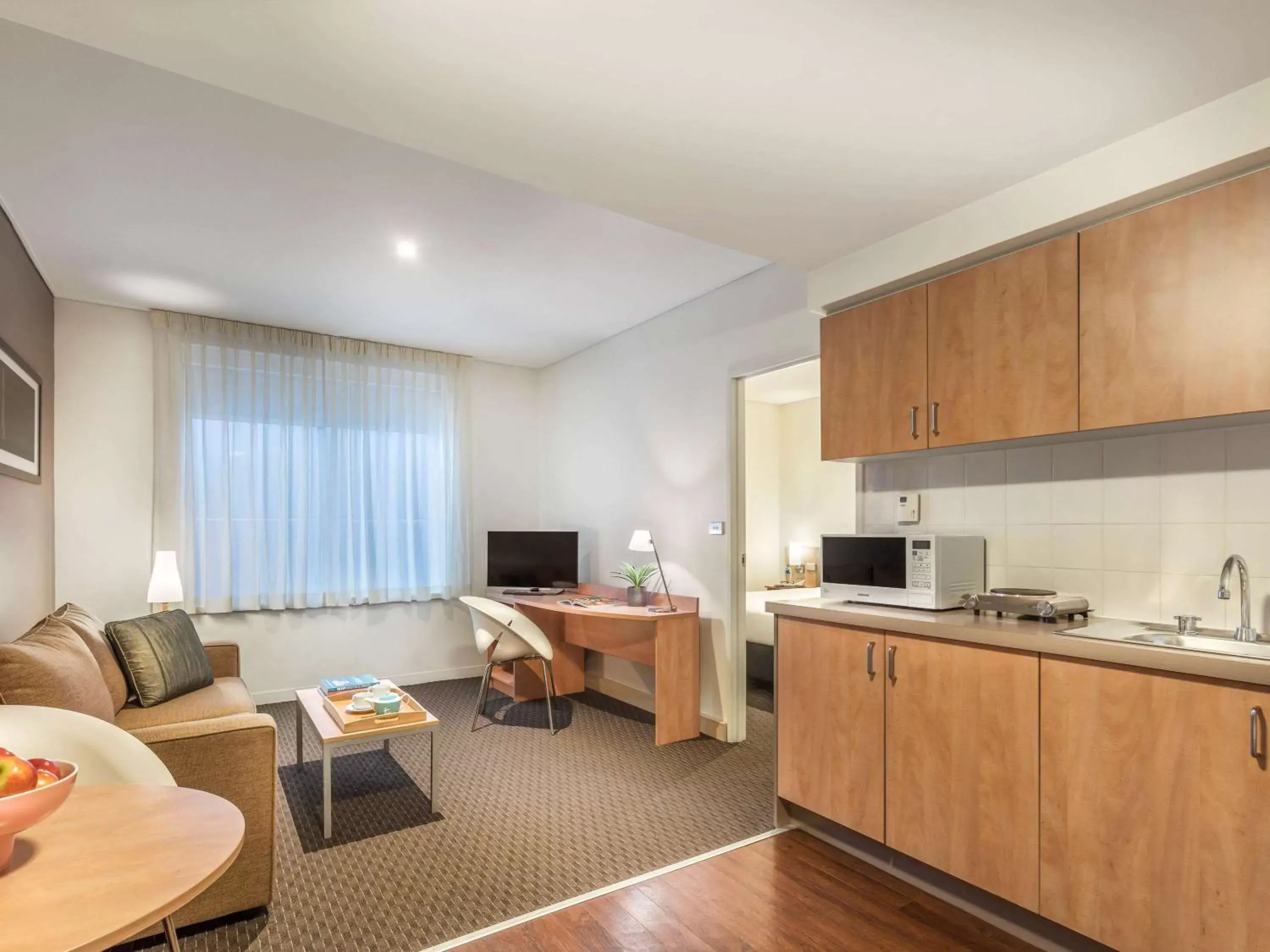 Photo of the whole room, Kitchen/Kitchenette in ibis Melbourne Hotel and Apartments