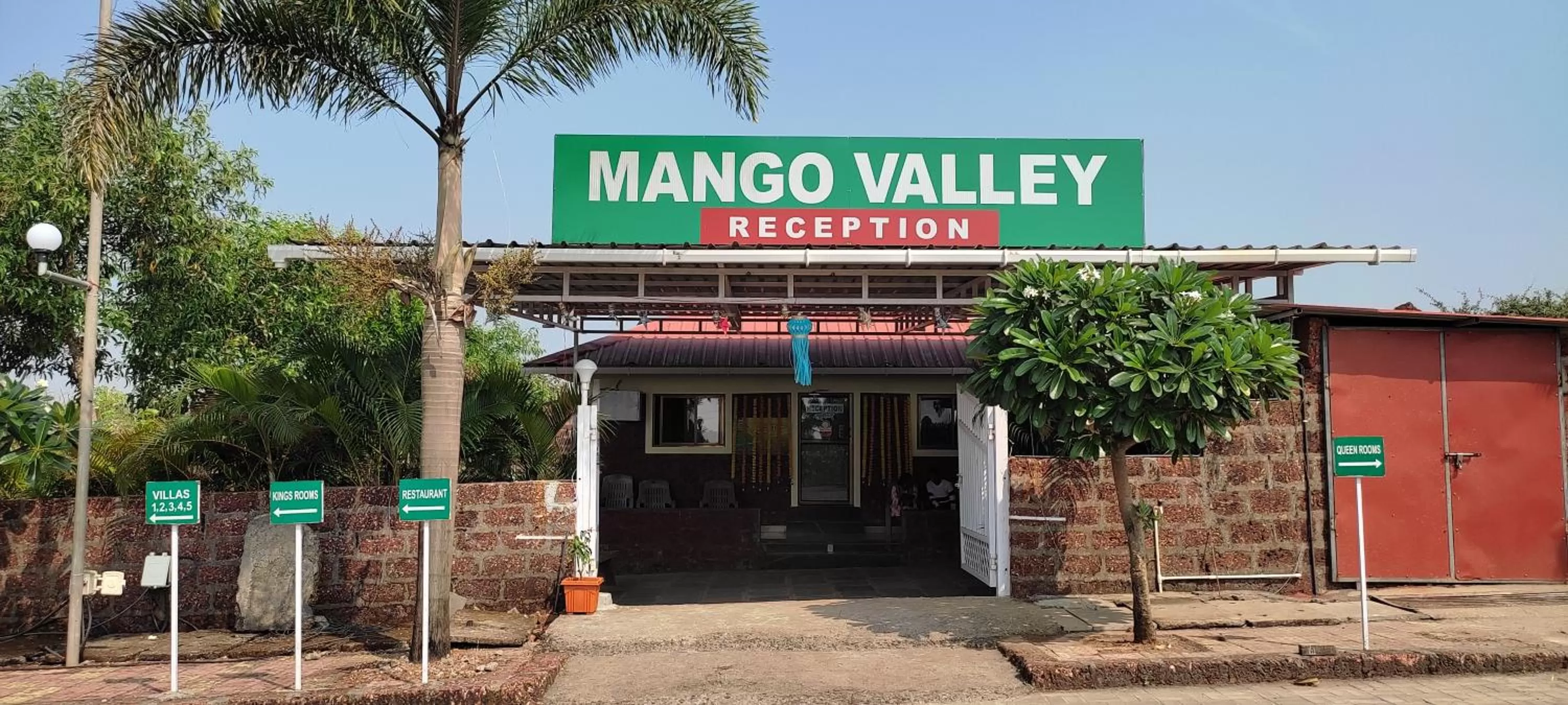 Property logo or sign in Mango Valley Resort Ganpatipule