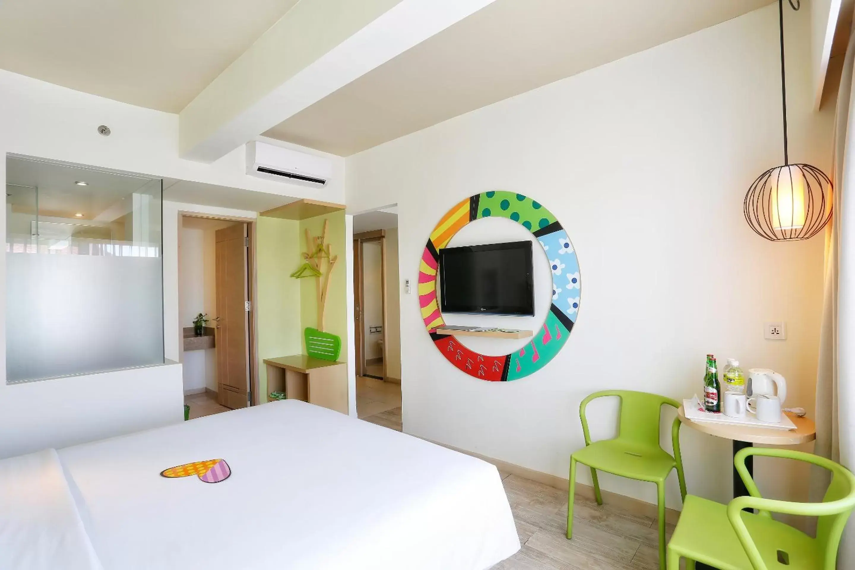 Bed in MaxOneHotels at Bukit Jimbaran Bed in MaxOneHotels at Bukit Jimbaran