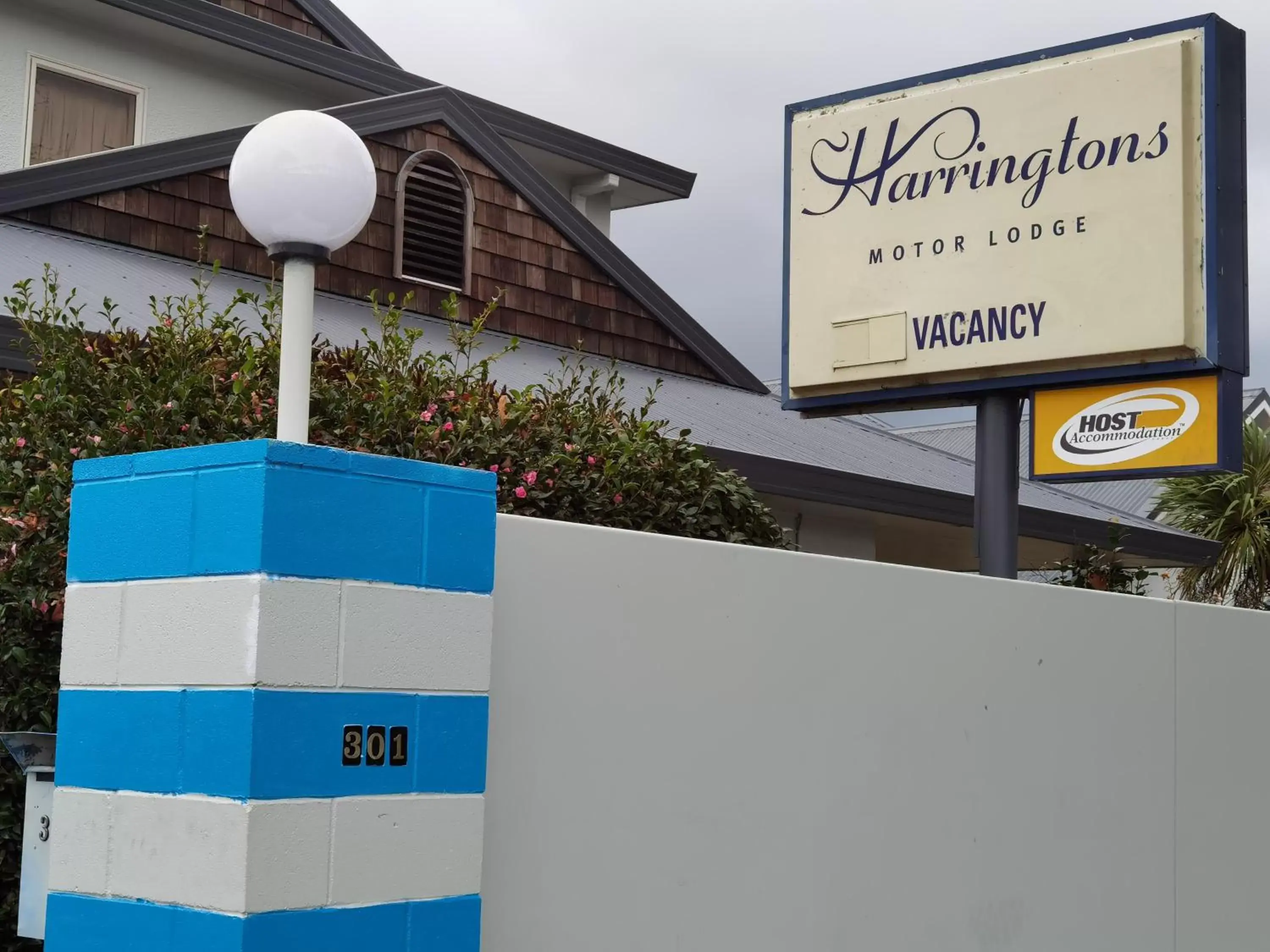 Property logo or sign in Harringtons Motor Lodge