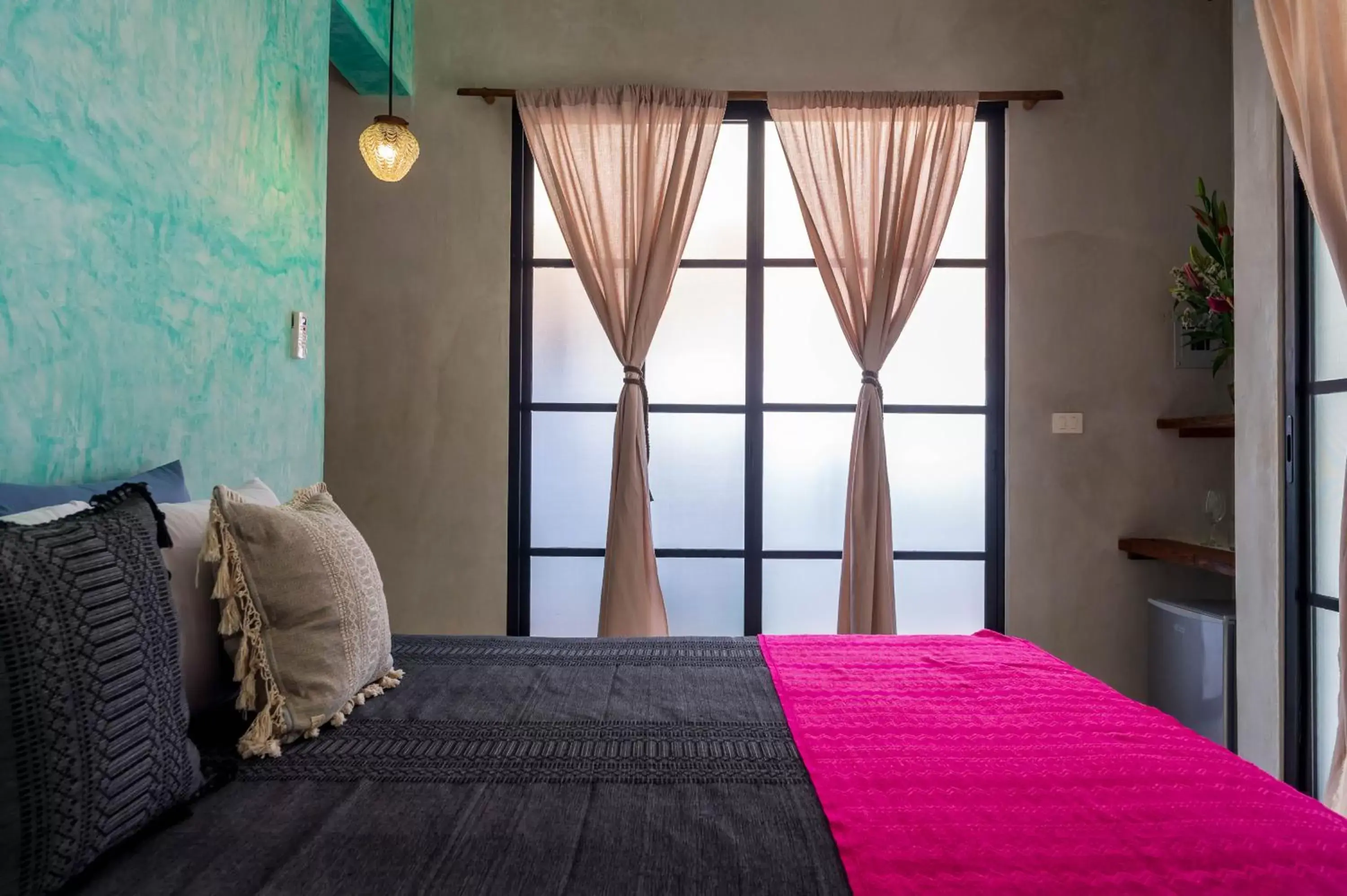 Bed in Turquoise Tulum Hotel