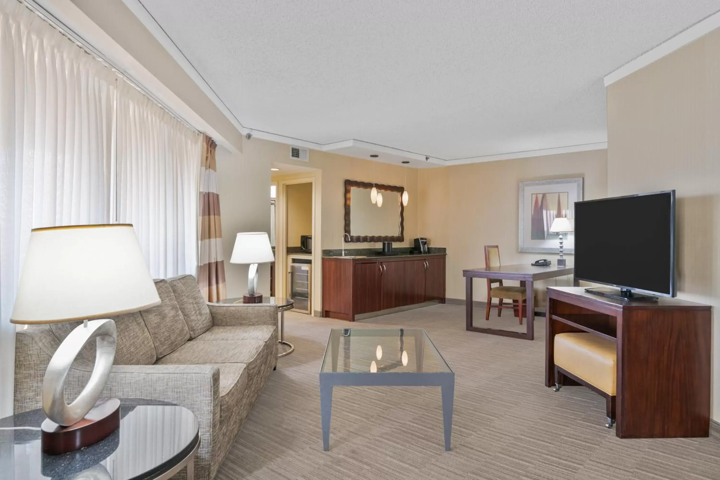 Living room, Seating Area in Harmony Suites Secaucus Meadowlands