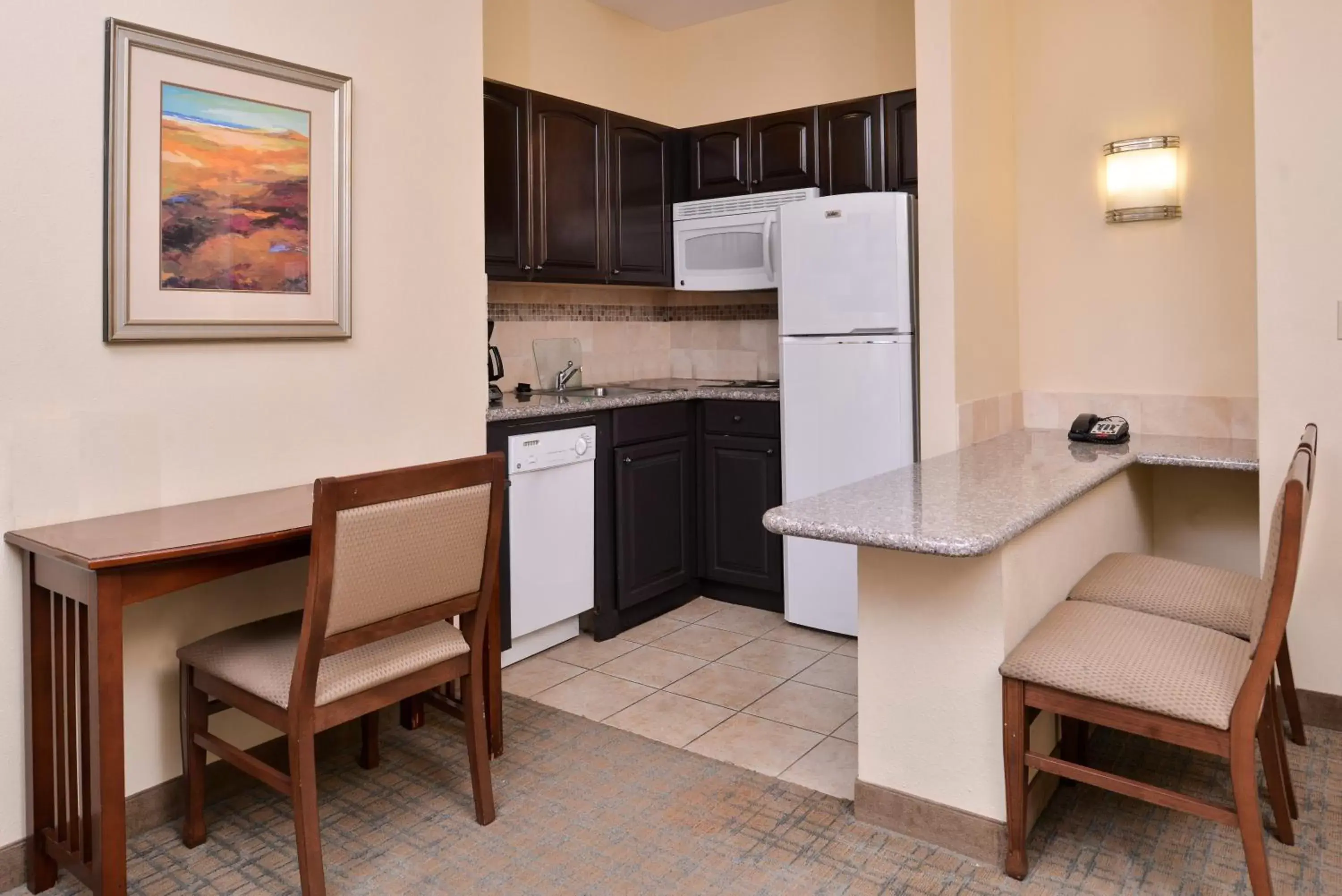 Photo of the whole room, Kitchen/Kitchenette in Staybridge Suites Oklahoma City, an IHG Hotel