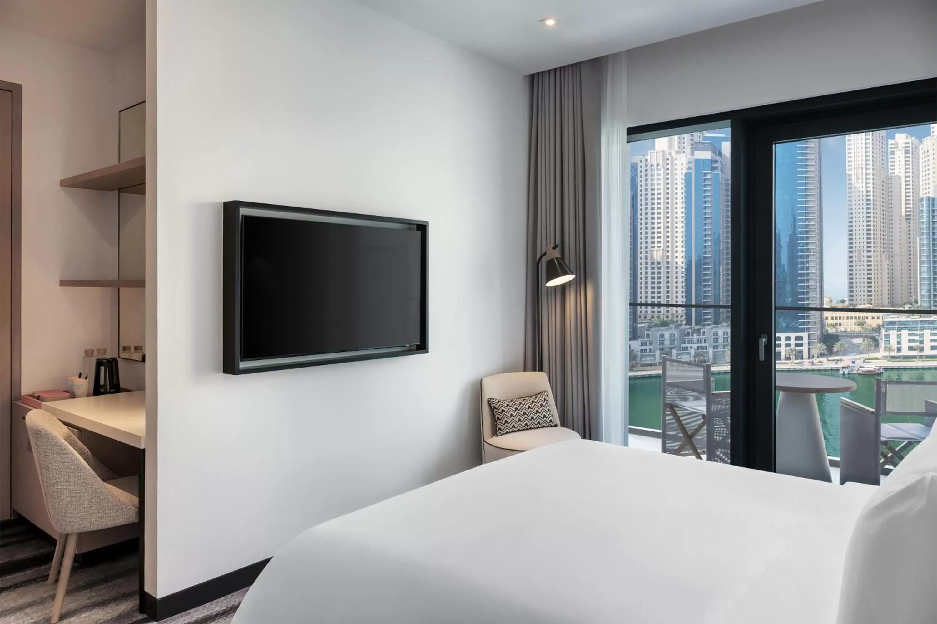 Bed, TV/Entertainment Center in Vida Dubai Marina & Yacht Club