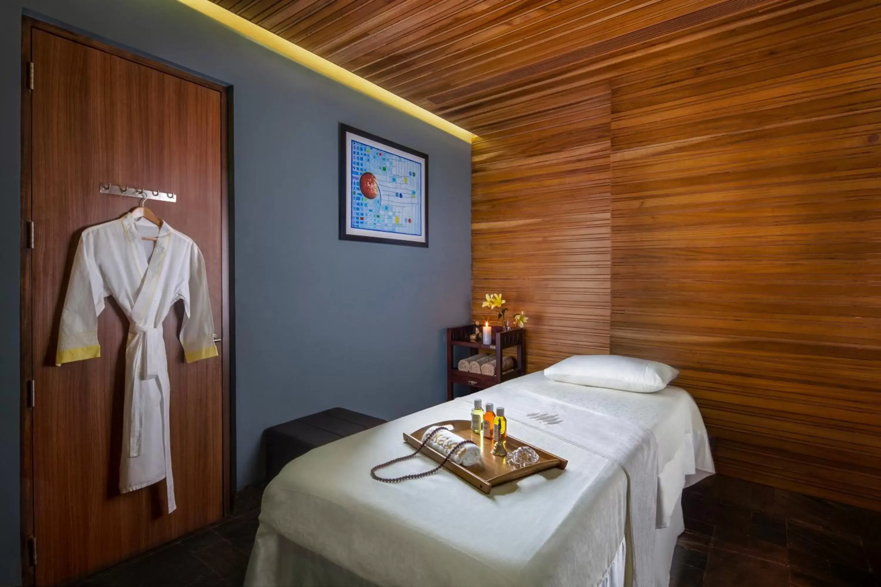 Massage in Sandal Suites by Lemon Tree Hotels