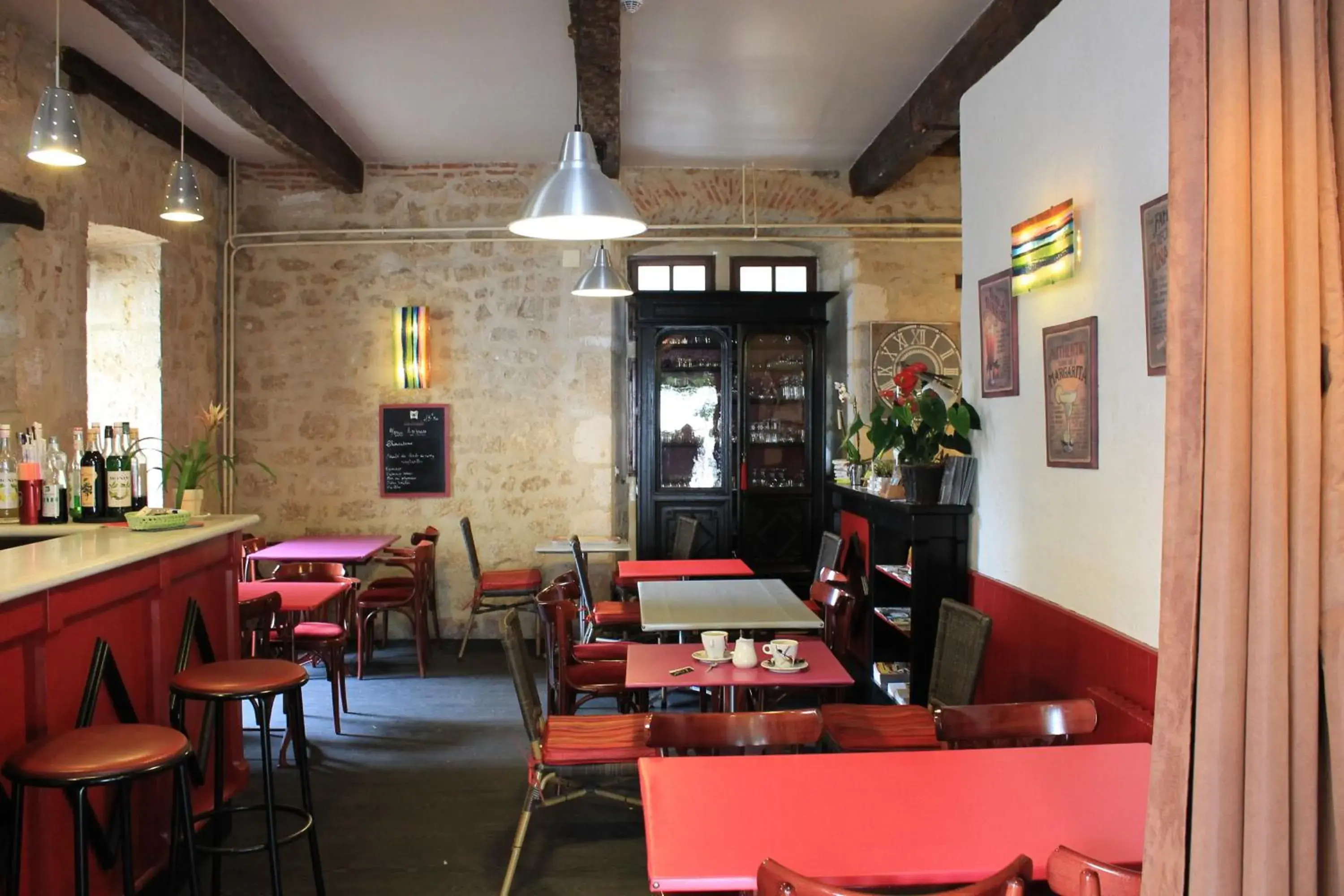 Lounge or bar in Logis Hotels- Auberge de la Tour - Hôtel et restaurant Lounge or bar in Logis Hotels- Auberge de la Tour - Hôtel et restaurant