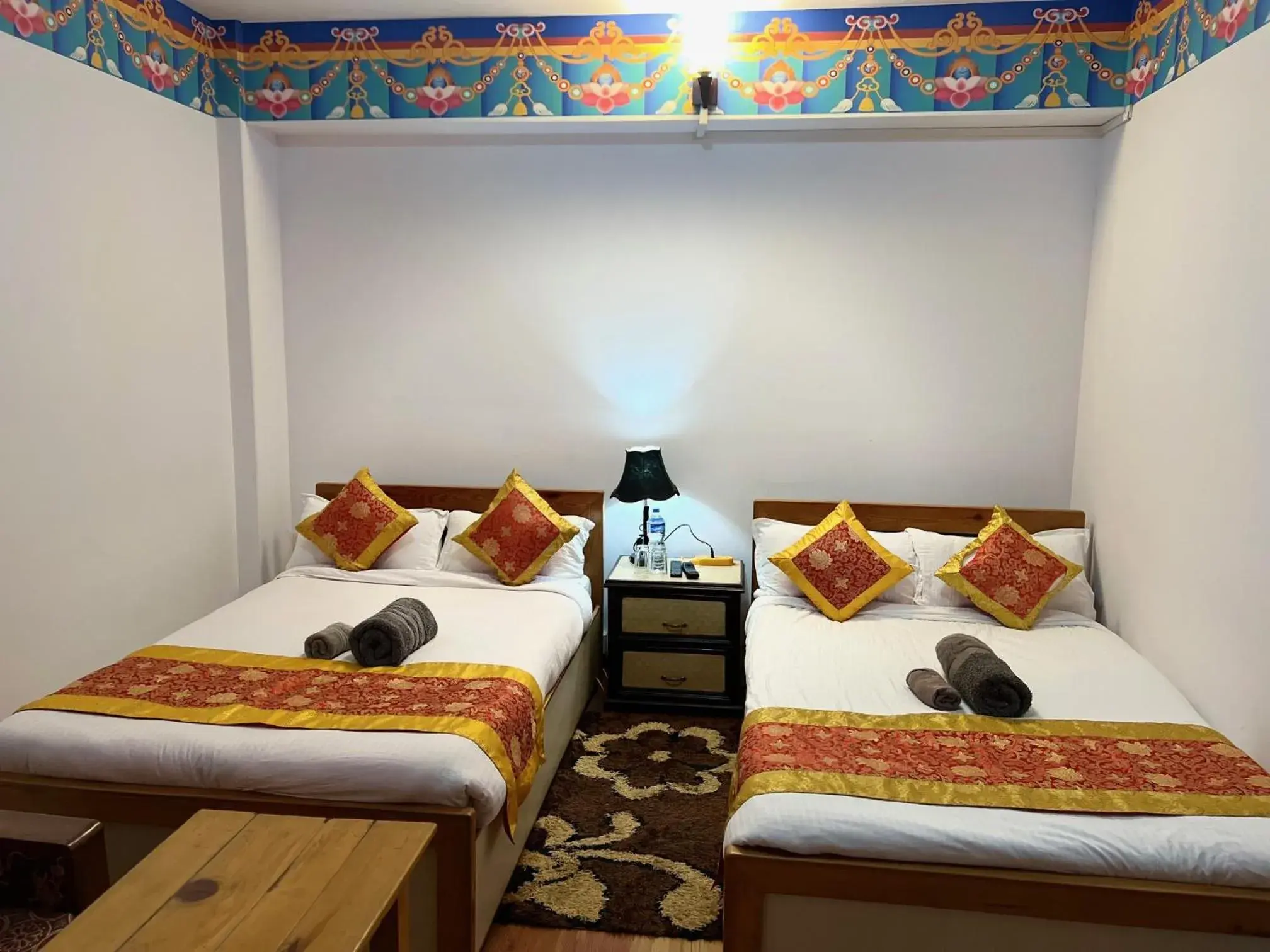 Bed in The Boudha Inn