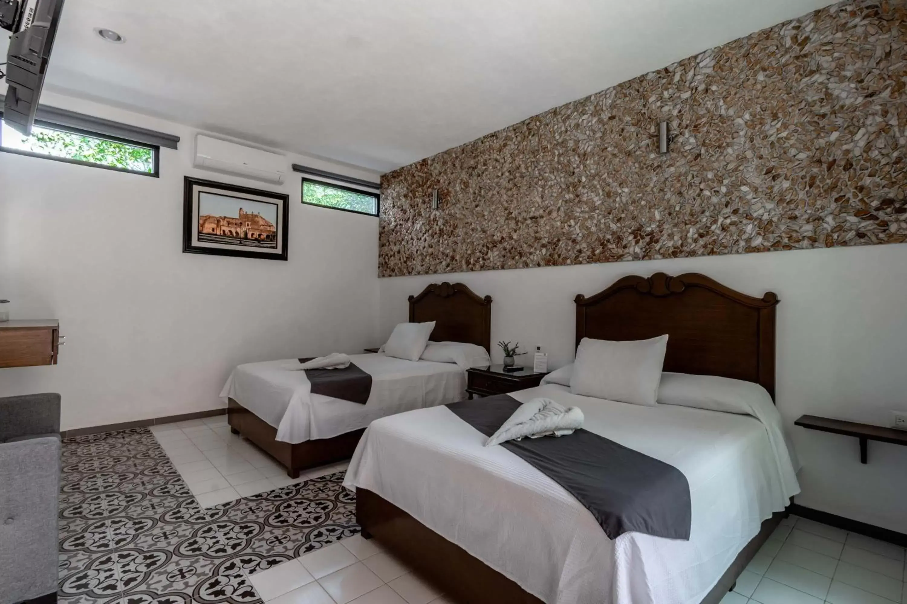 Bed in Hotel Colonial Zaci by GuruHotel