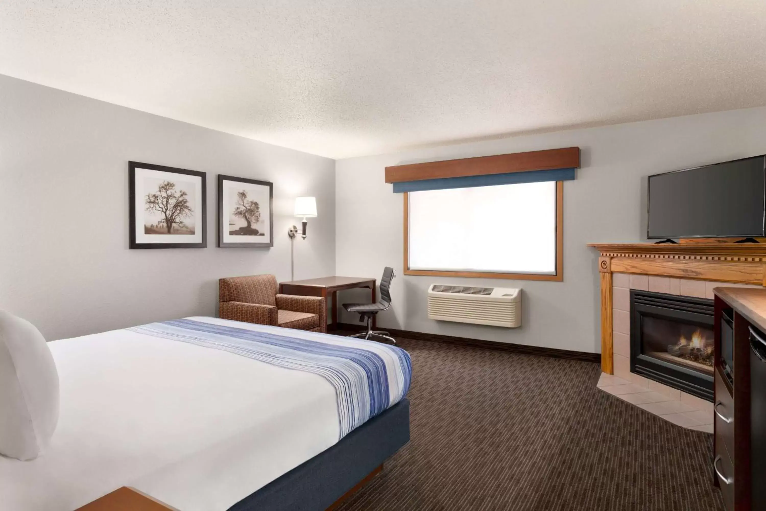 Photo of the whole room in AmericInn by Wyndham Sauk Centre