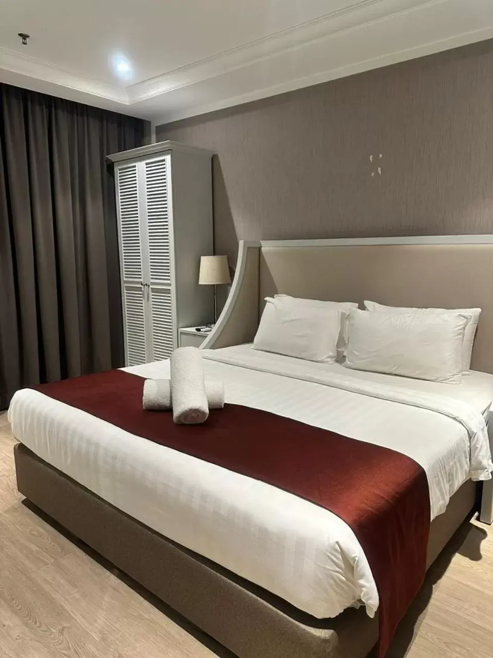 Bed in The Granite Luxury Hotel Penang