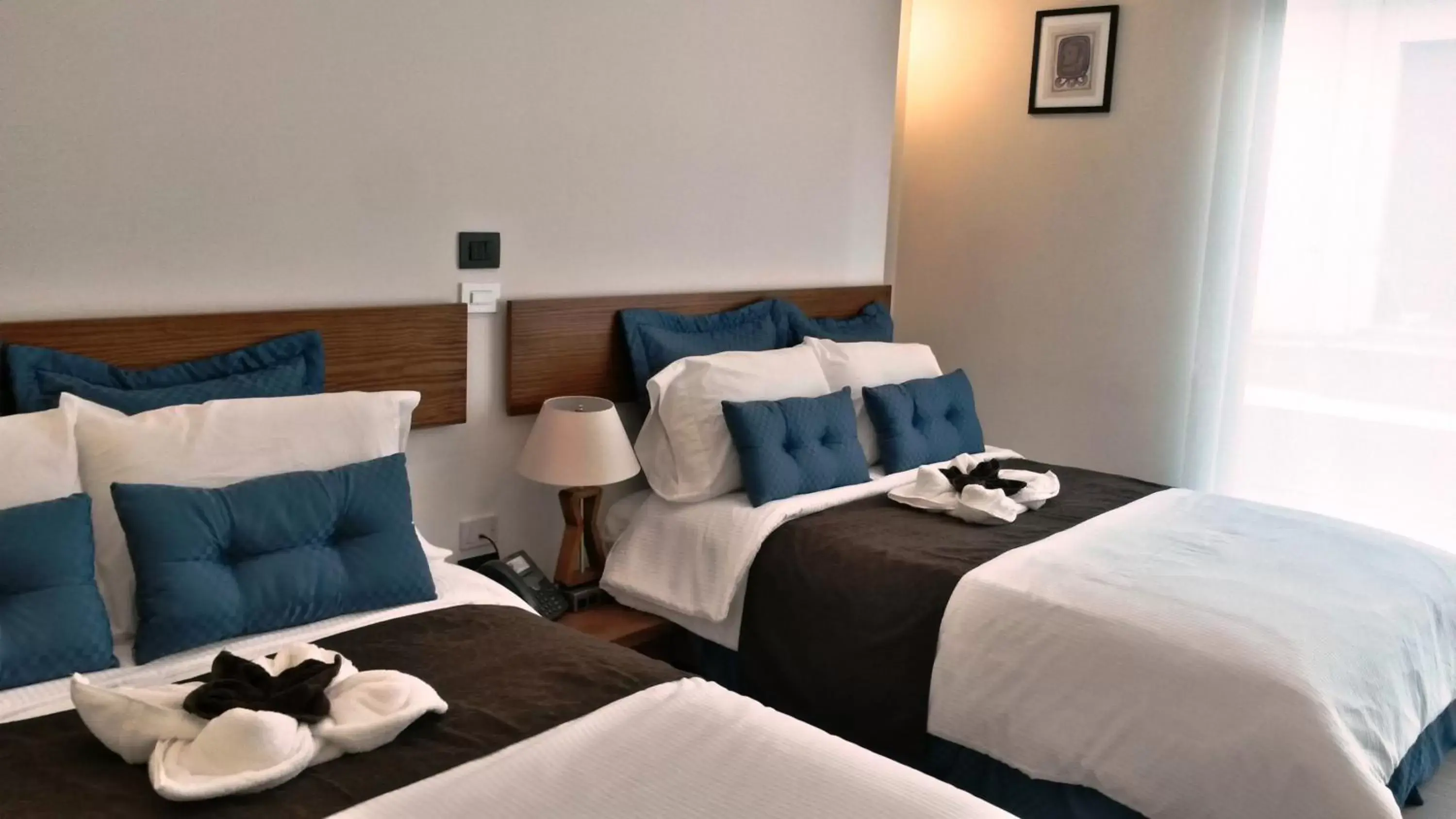 Bed in Hotel Nak'An Secreto Maya