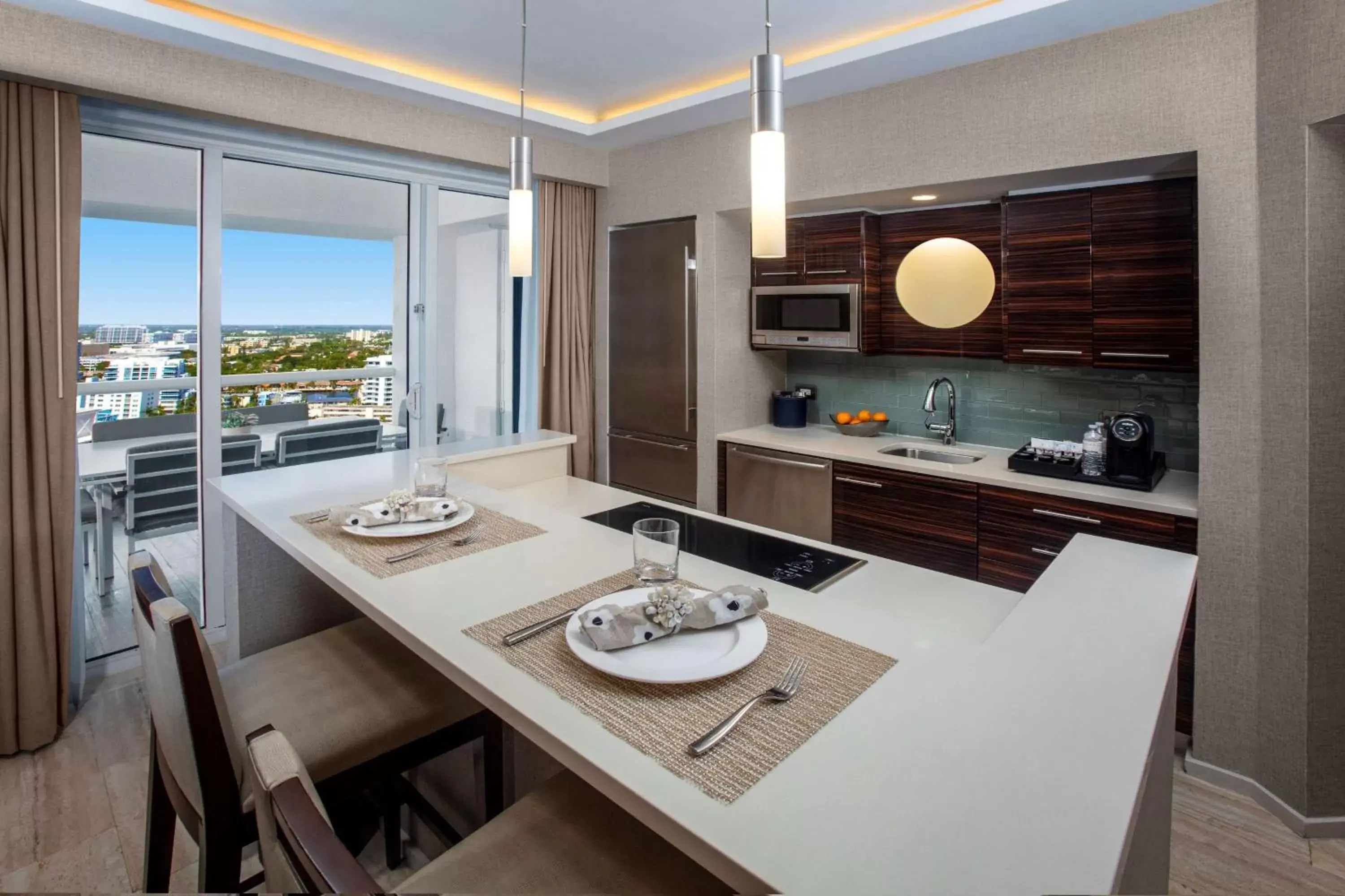 Kitchen or kitchenette, Dining Area in Conrad Fort Lauderdale Beach