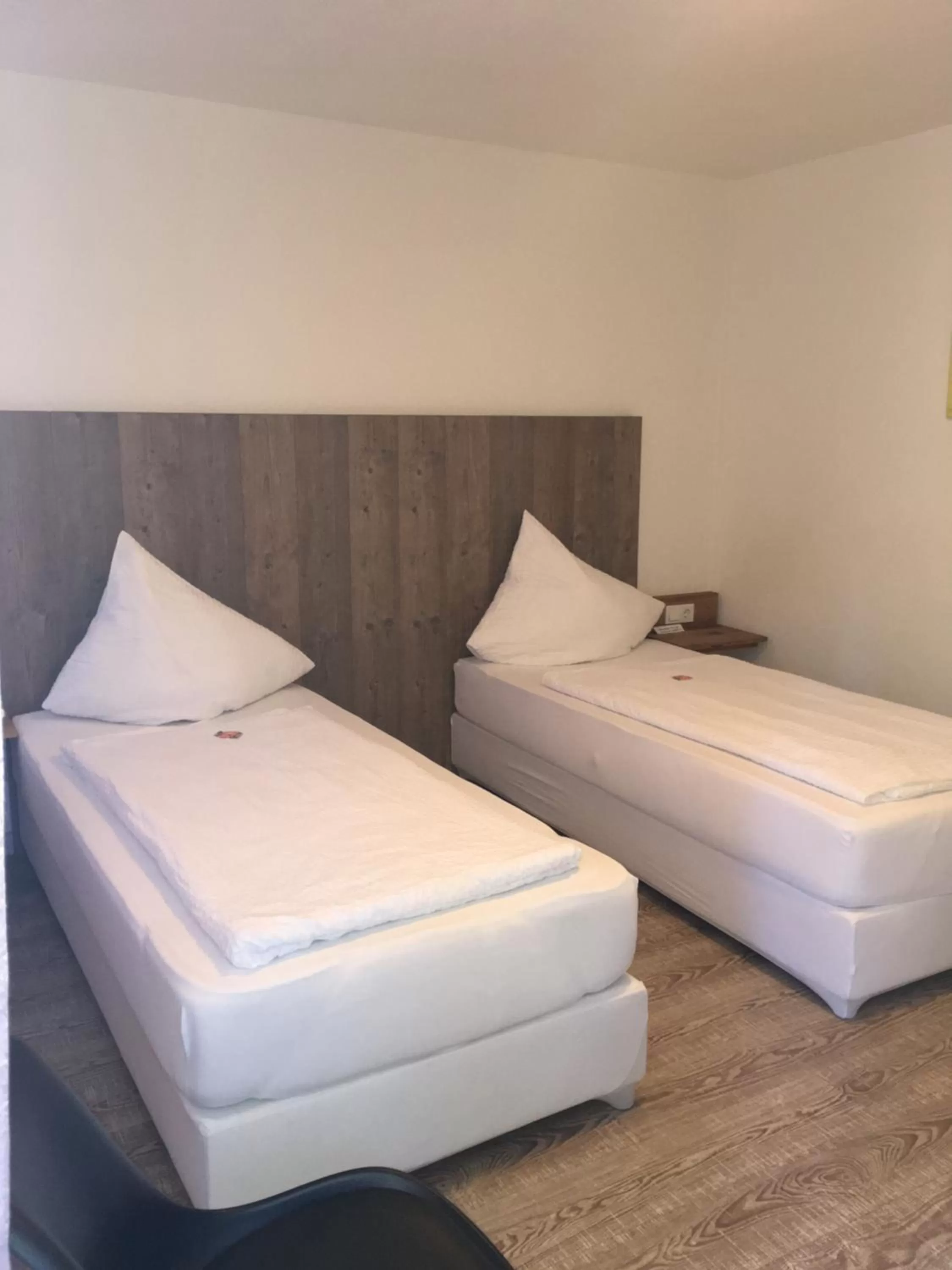 Bed in Smart Stay Rooms Feldkirch