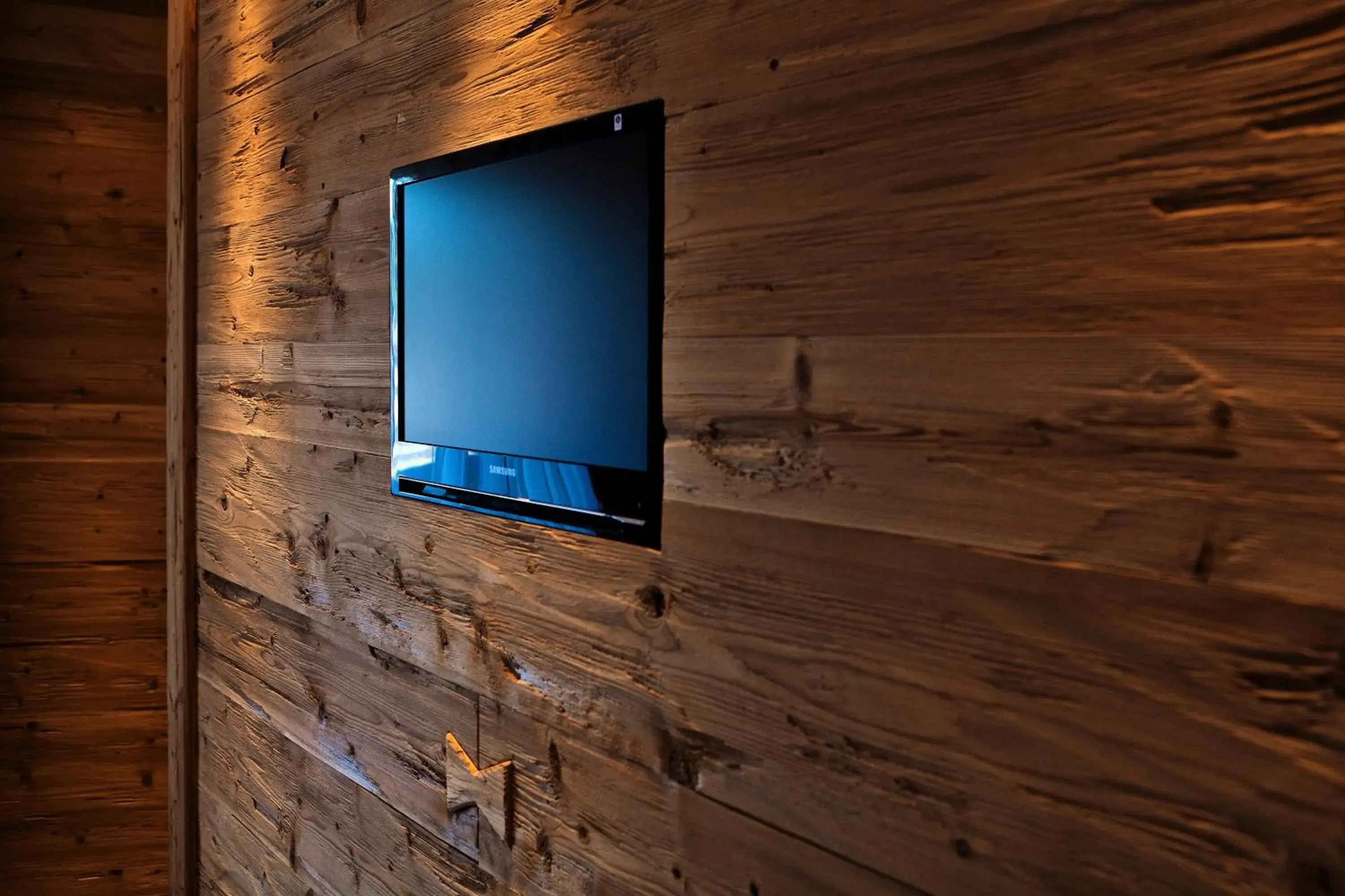 Decorative detail, TV/Entertainment Center in Arosa Vetter Hotel