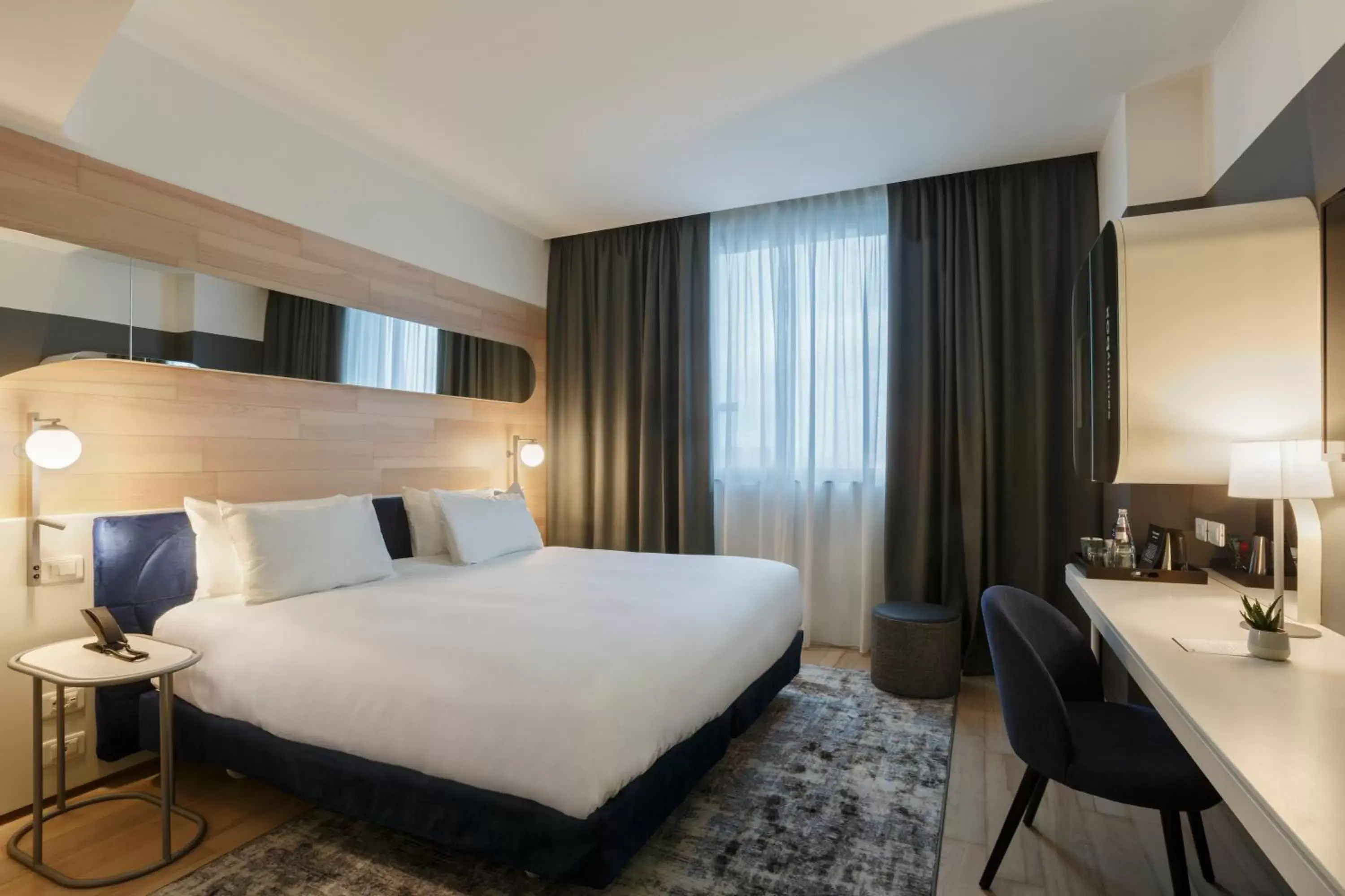 Photo of the whole room, Bed in voco Milan-Fiere, an IHG Hotel