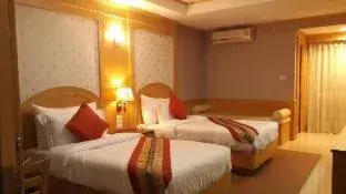 Bed in The Lion King Hotel Udonthani Bed in The Lion King Hotel Udonthani