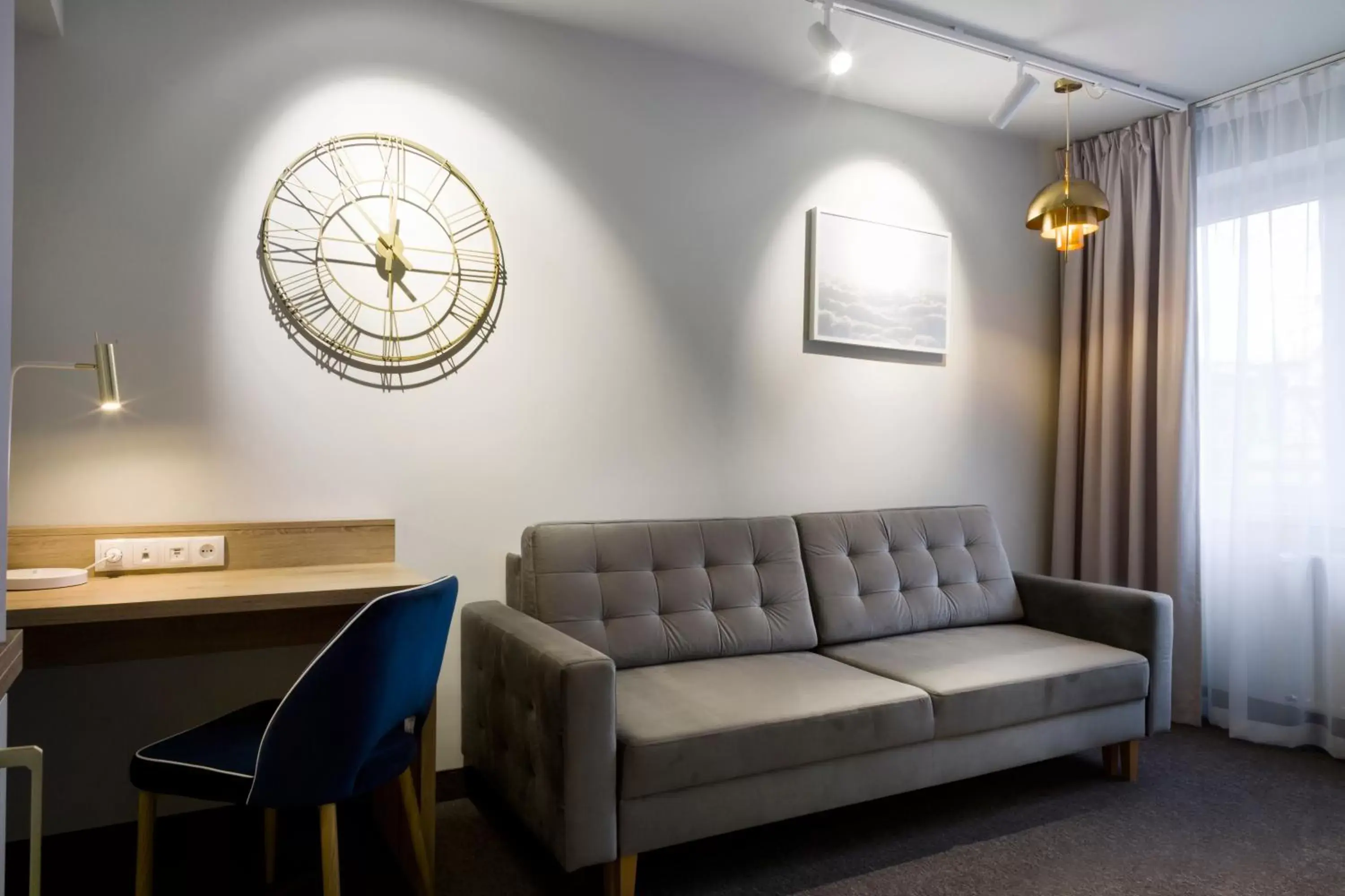 Bed, Seating Area in Hotel Kopernik