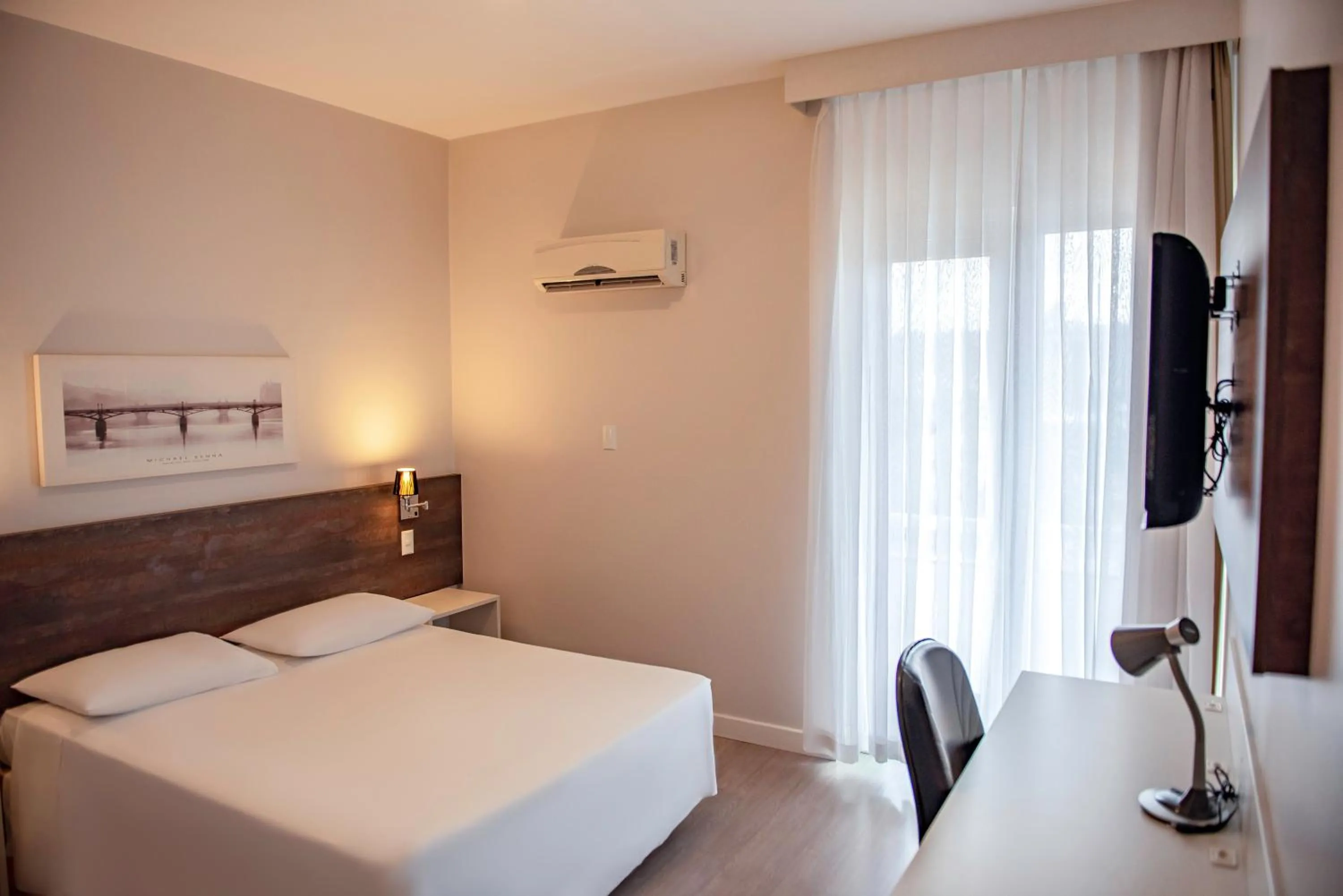 Bed in Charrua Hotel