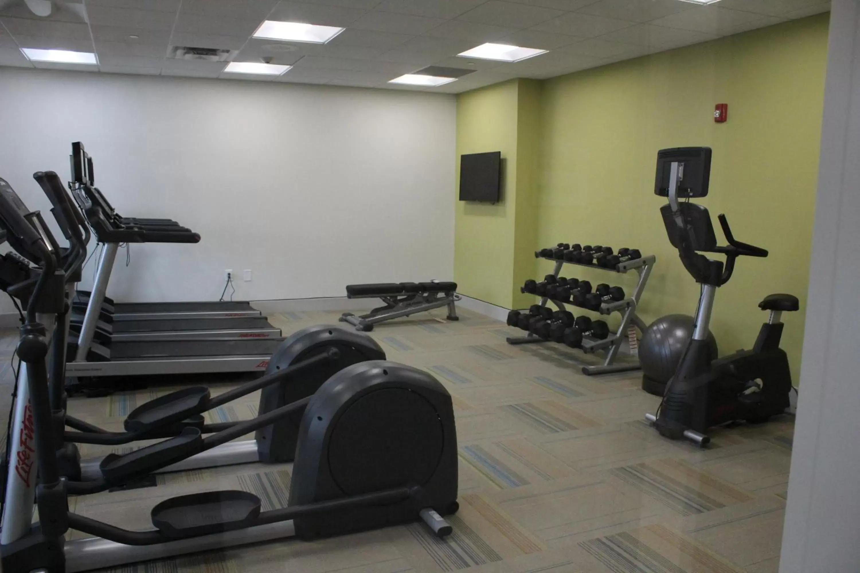 Swimming pool, Fitness Center/Facilities in Holiday Inn Express & Suites - Milledgeville, an IHG Hotel