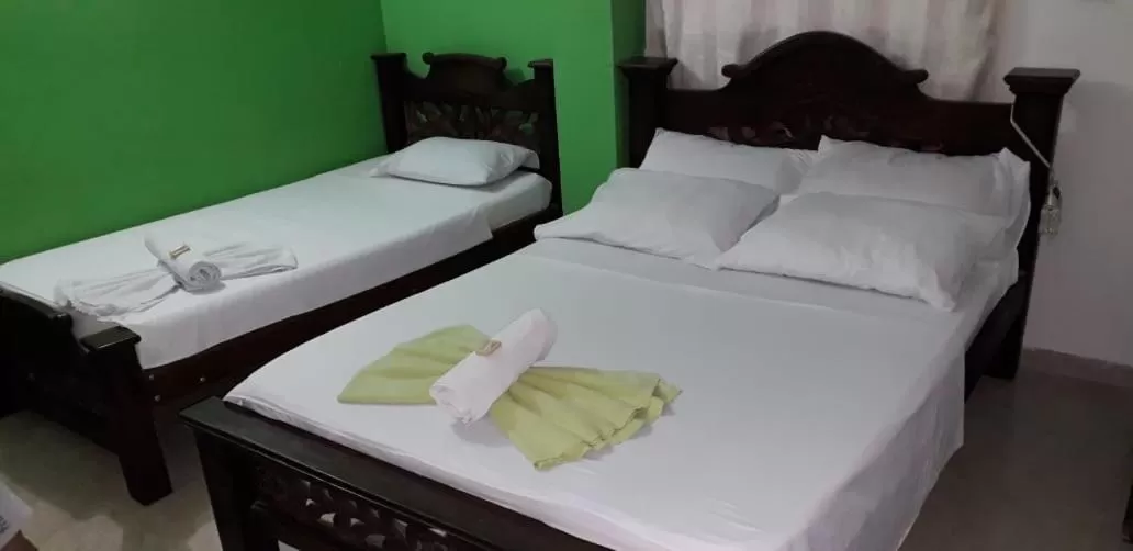 Bed in Hotel Mansión del Cesar