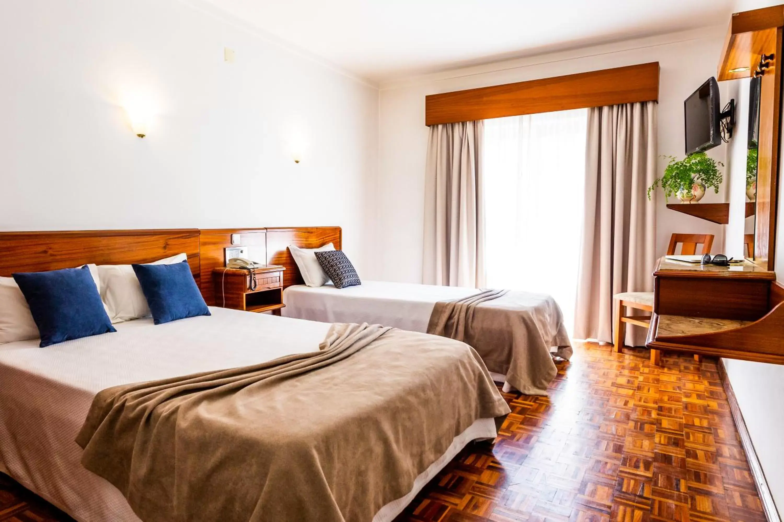 Bed in Dona Amélia Hotel by RIDAN Hotels