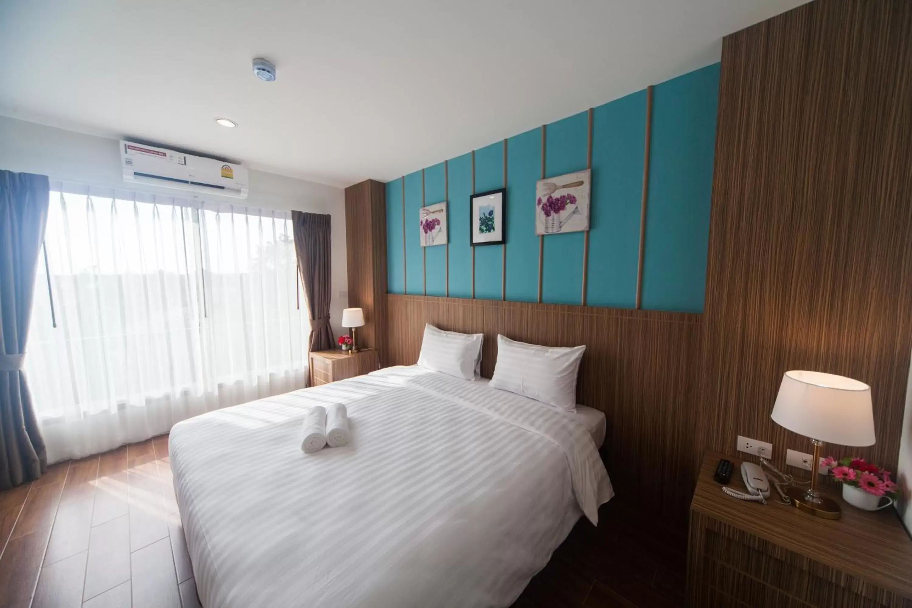 Bedroom, Bed in Anchan Laguna Hotel โรงแรมอัญชันลากูน่า Bedroom, Bed in Anchan Laguna Hotel โรงแรมอัญชันลากูน่า