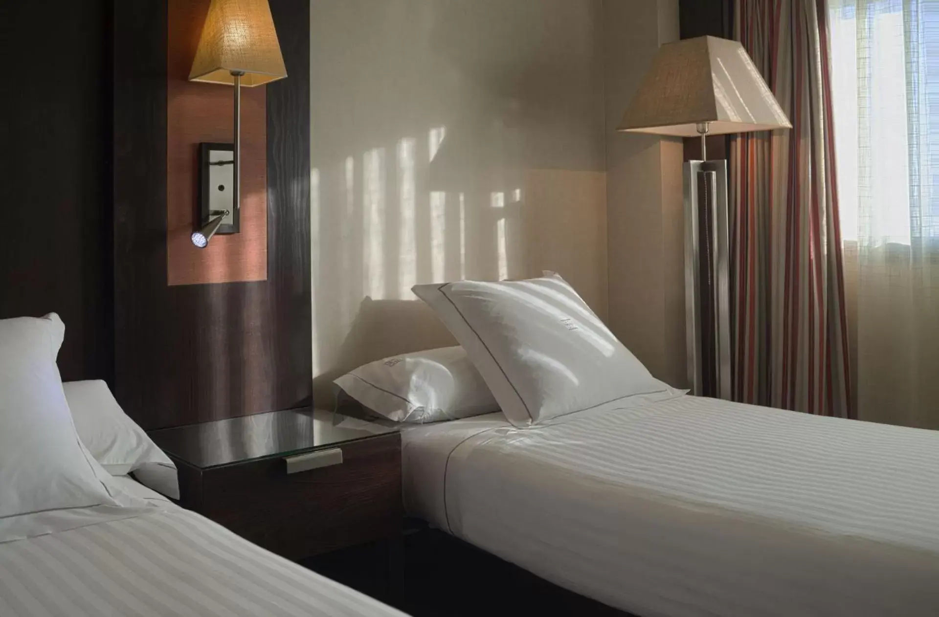 Bed in Hotel Cordoba Center