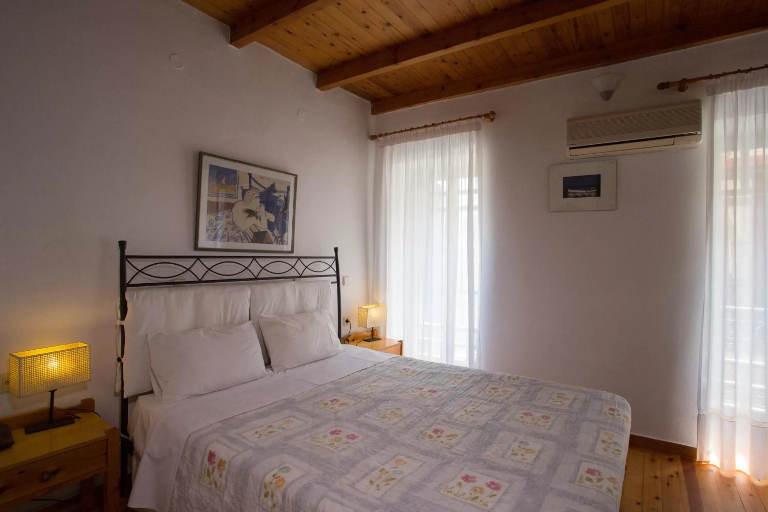Bed in Nostos Hotel