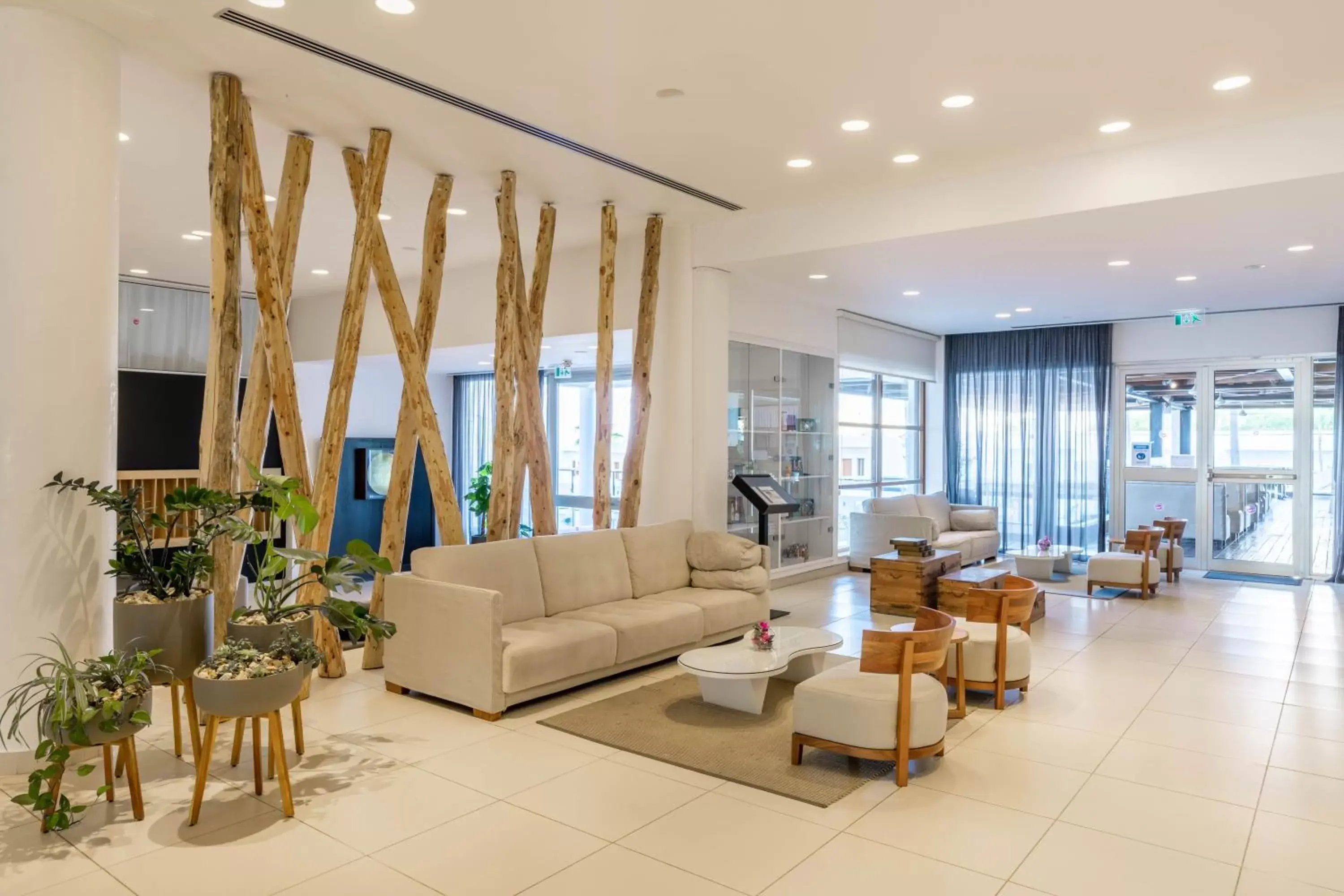 Communal lounge/ TV room, Lobby/Reception in Napa Mermaid Hotel & Suites
