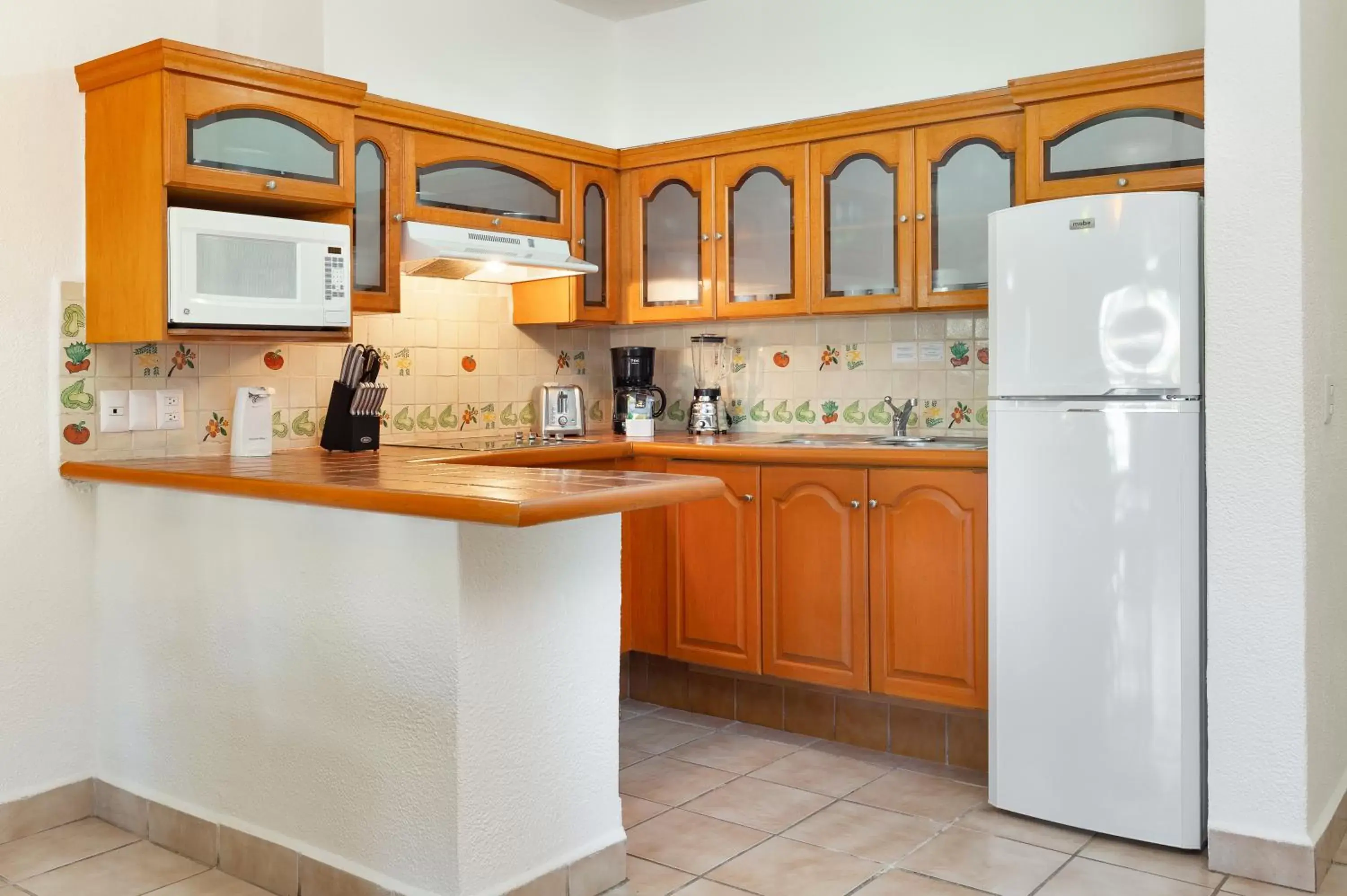 Kitchen or kitchenette in Villa del Palmar Beach Resort & Spa Puerto Vallarta